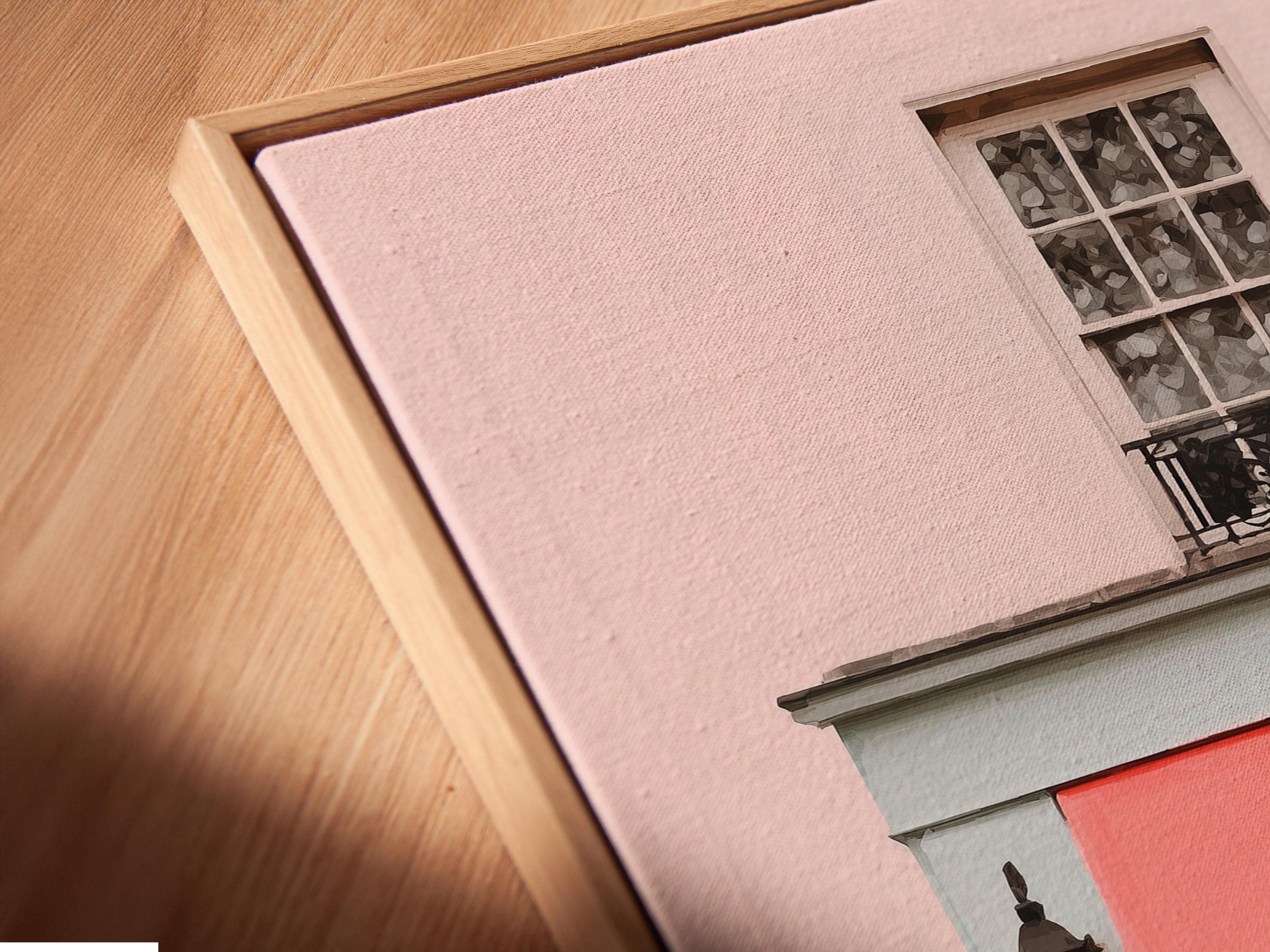 Pastel pink café front illustration with a red awning, lanterns, window and green shrubs detail view