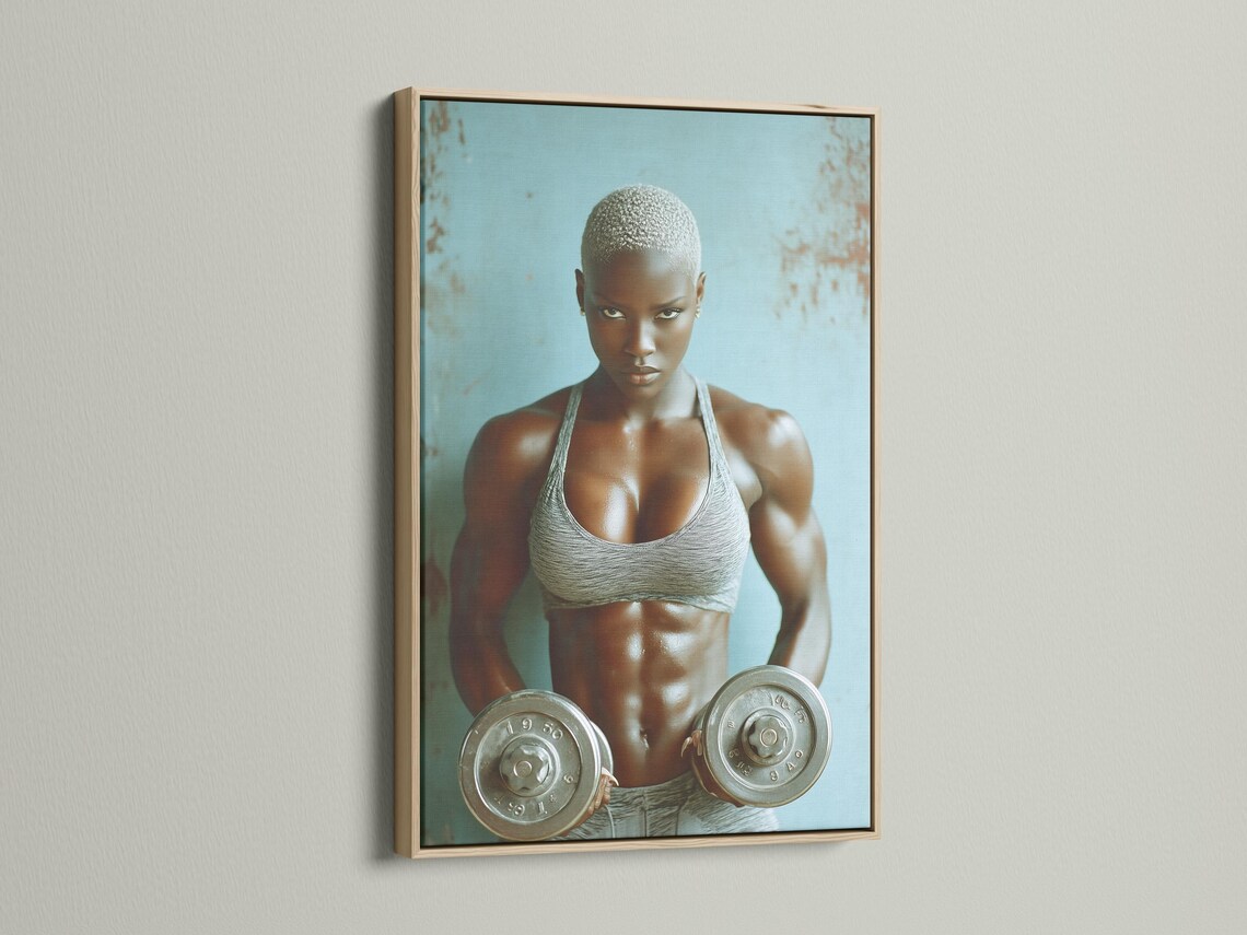 Room mockup showing a framed teal fitness portrait of an athletic woman holding weight plates