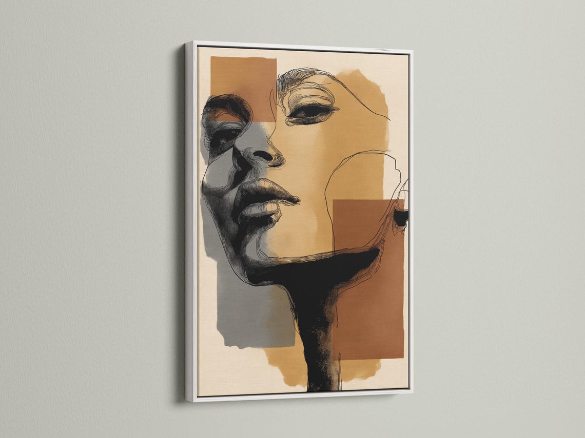Room mockup showing a framed minimalist abstract face artwork with neutral earth-tone blocks