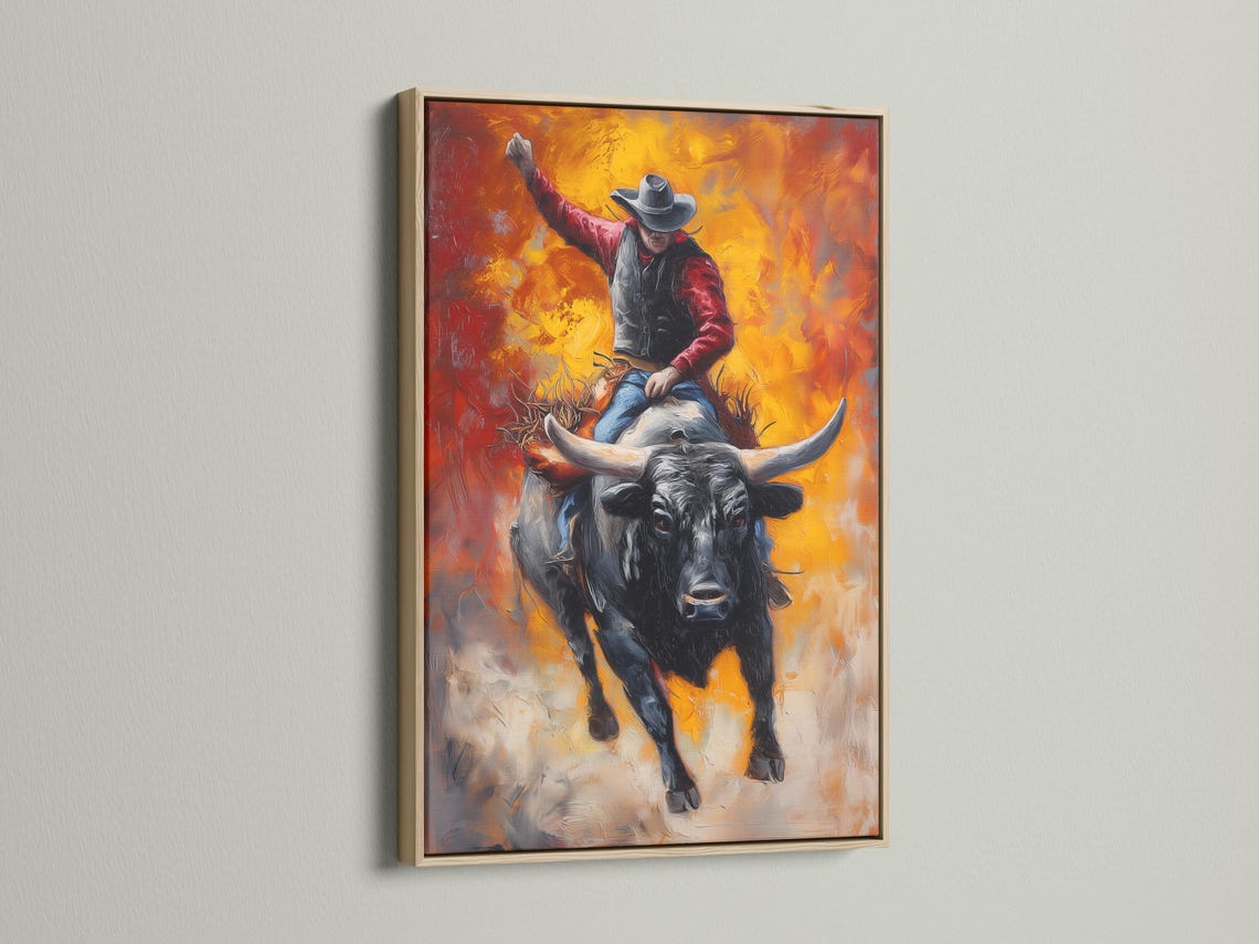 Cowboy riding a black bull in a western scene with flame-like orange and gold background detail view