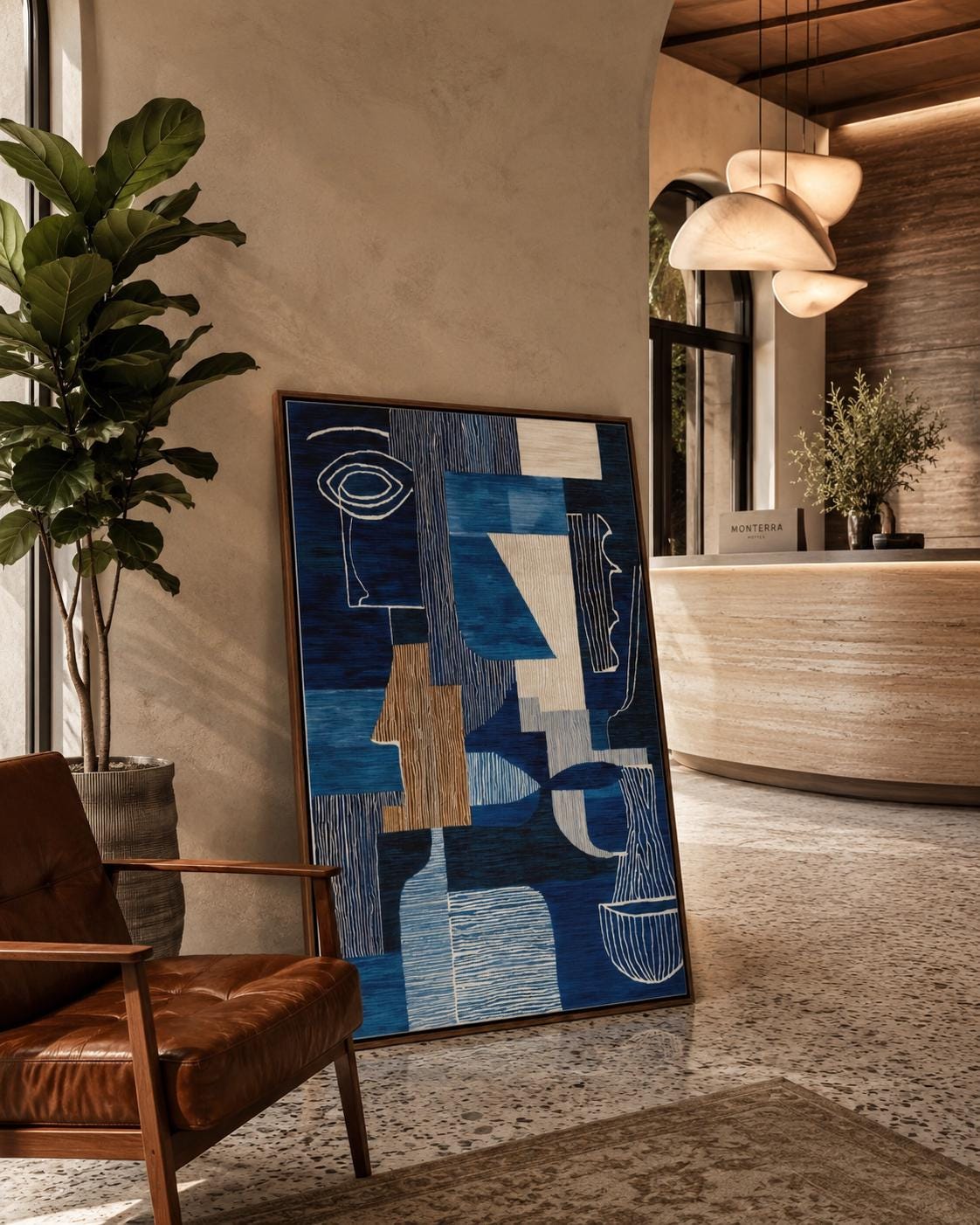 Woman holding a cup in a cafe-like space with a framed blue abstract face artwork on the wall