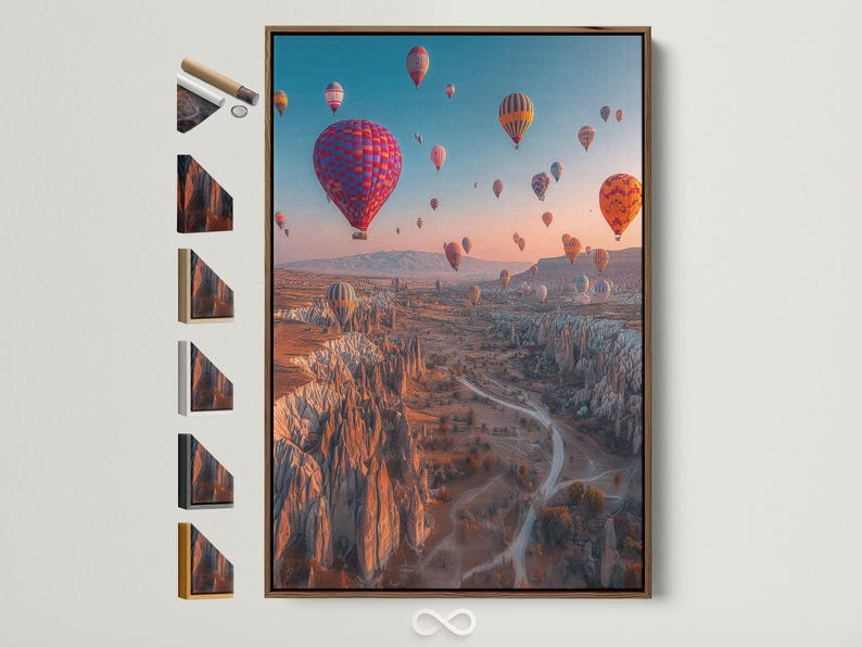 A dusk landscape with multiple colourful hot air balloons in the sky over a rocky valley