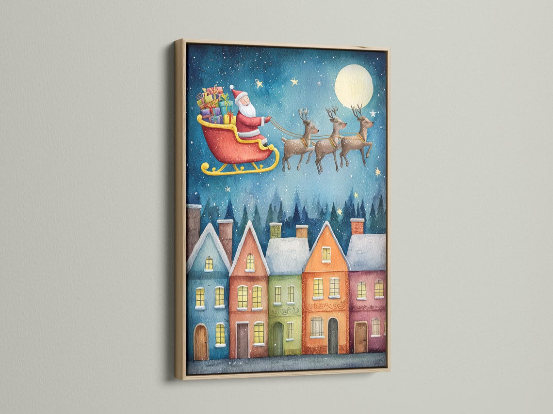 Illustrated Christmas night scene of Santa flying a sleigh with reindeer over a snowy town with glowing windows detail view
