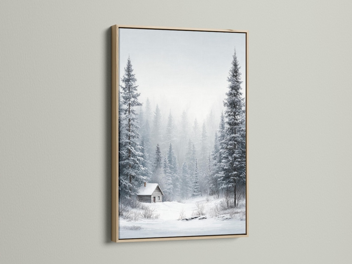 Snowy winter forest scene with pine trees, mist, and a small cabin detail view