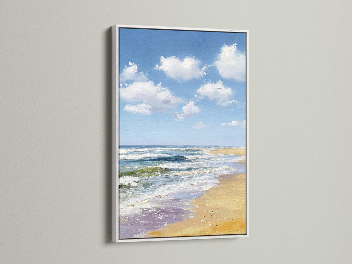 Blue ocean seascape with fluffy white clouds and foamy waves over sandy shore detail view