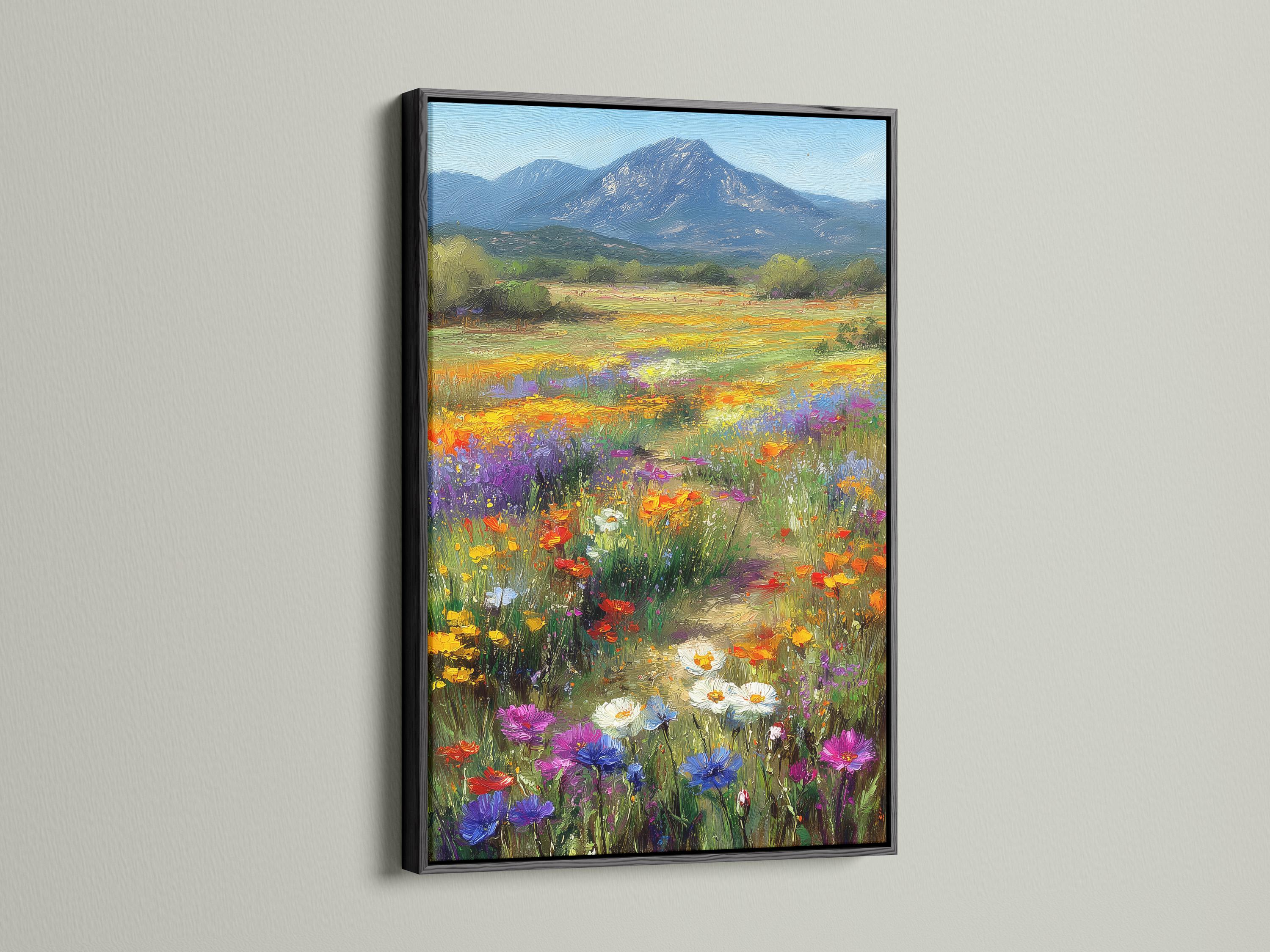 Wildflower meadow landscape with colourful flowers and a blue mountain detail view