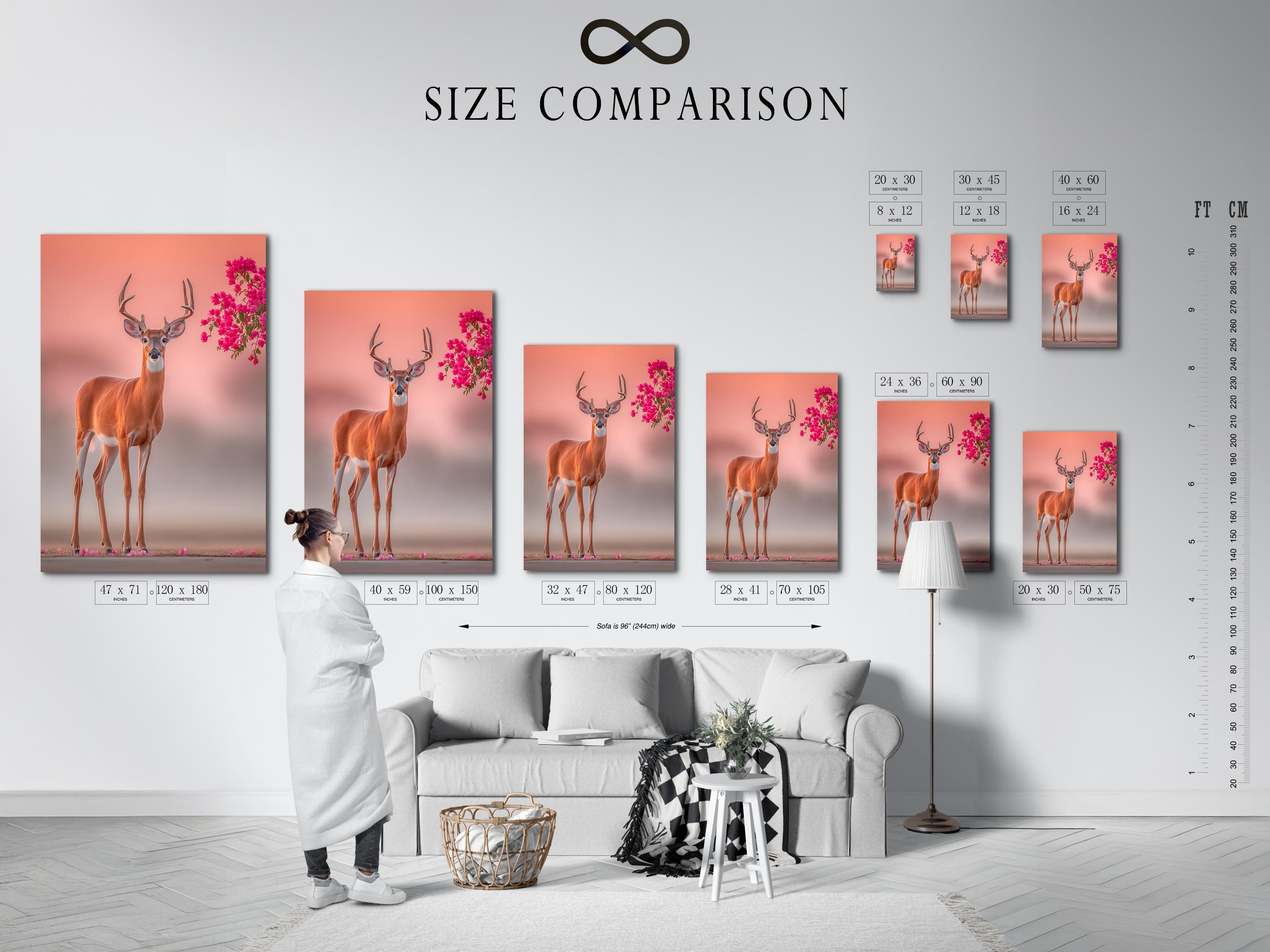 Deer portrait with tall antlers against a blush pink background and pink blossoms detail view