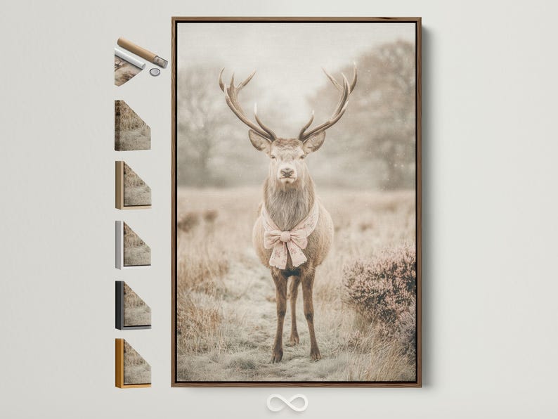 Deer portrait with raised antlers in a misty field, wearing a pale pink bow