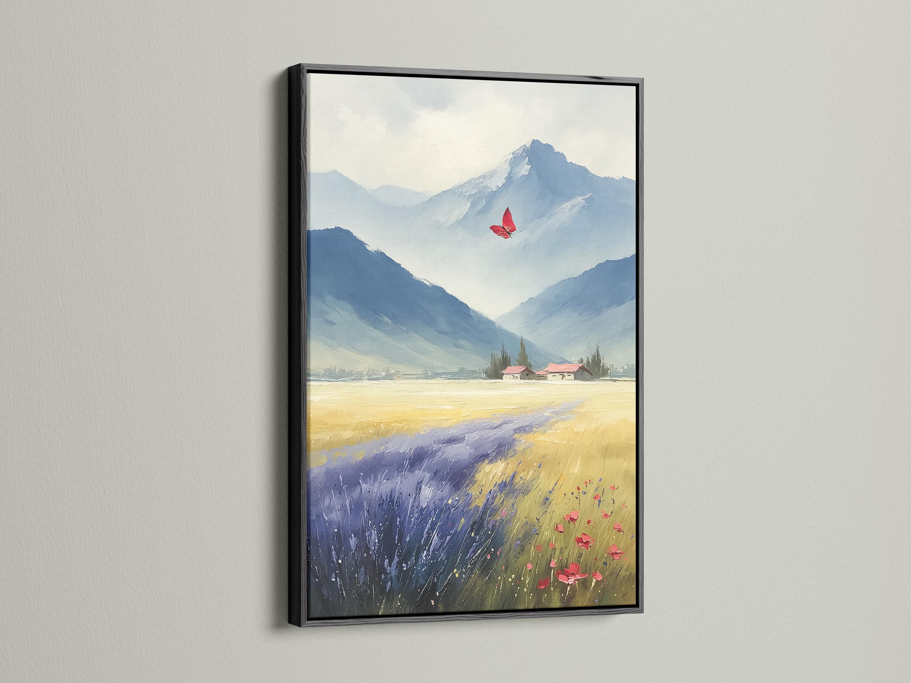Room mockup showing a framed blue mountain landscape artwork with a red butterfly
