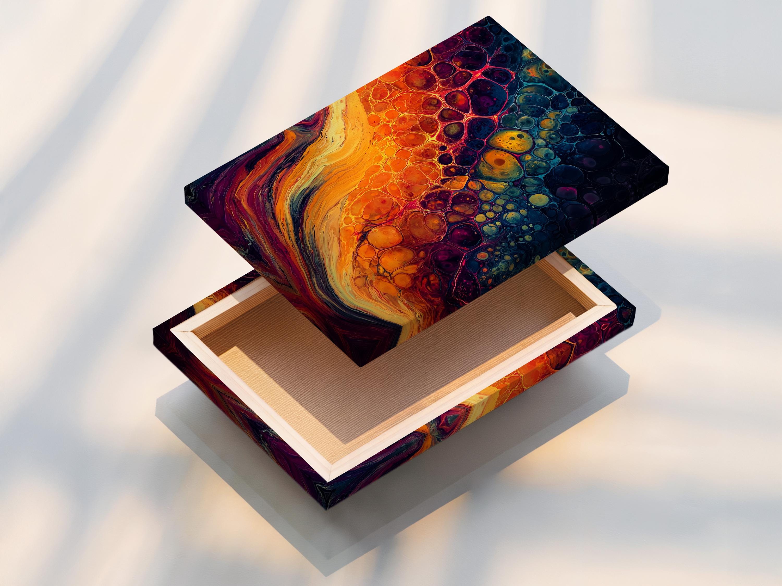 Abstract fluid artwork with orange and teal swirls and bubble-like circles detail view
