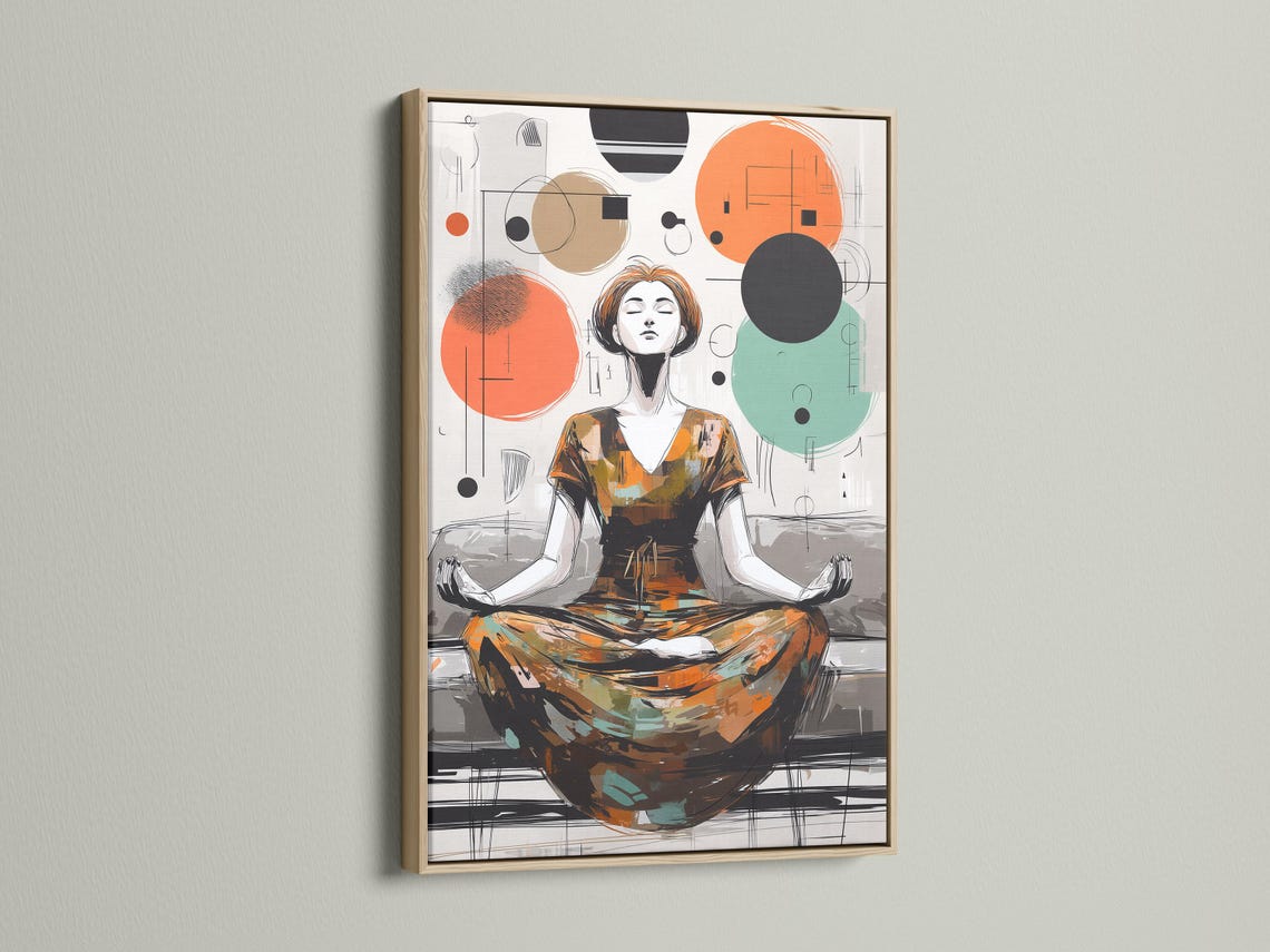 Framed artwork showing a woman meditating with floating geometric circles in orange, teal and charcoal detail view