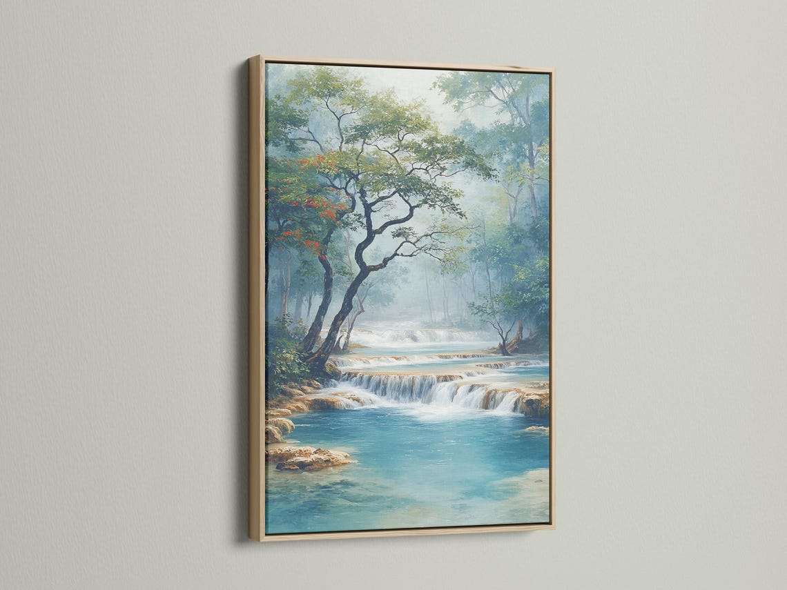 Blue and green waterfall landscape with misty trees and turquoise water detail view