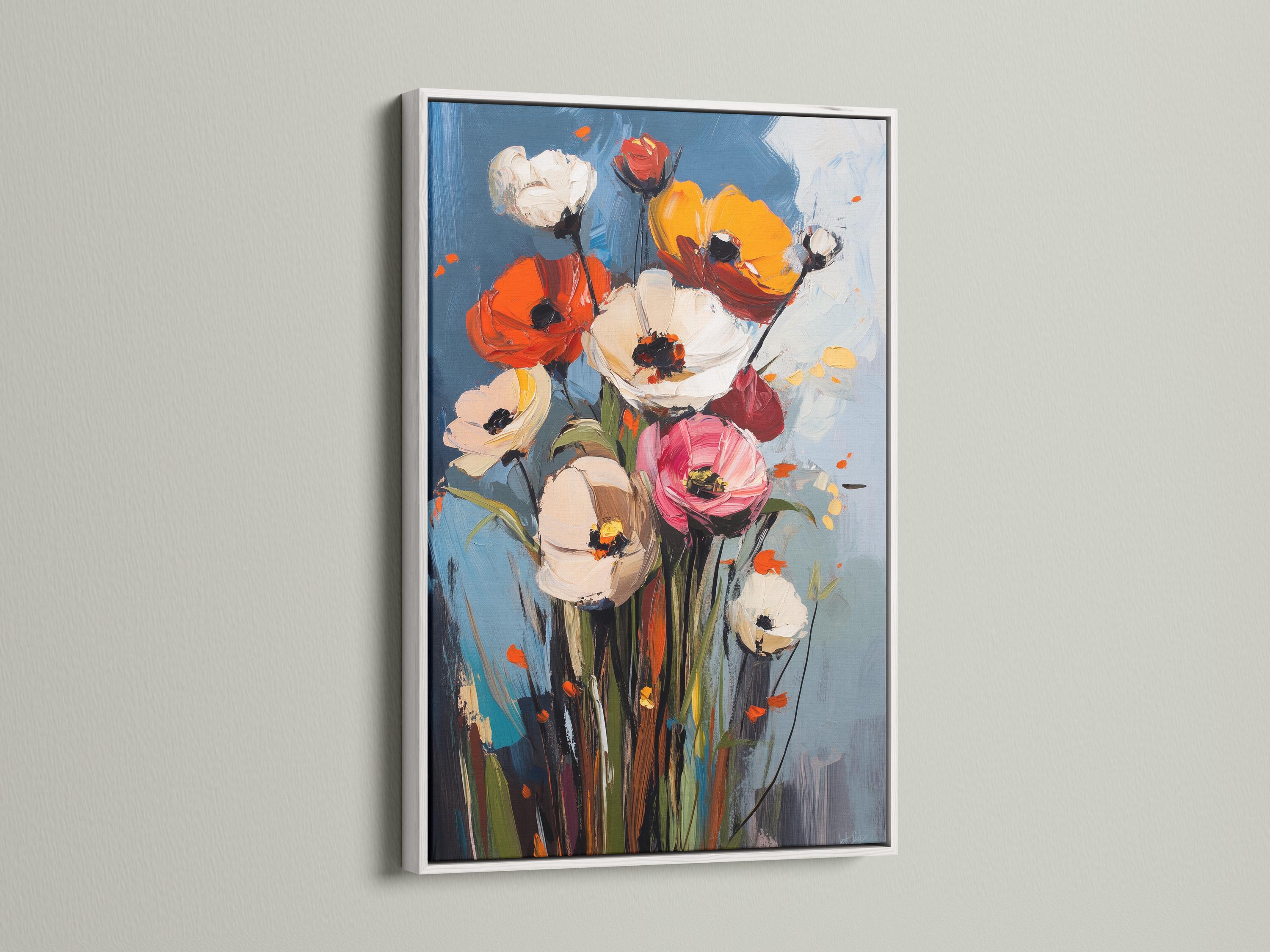 Room mockup showing framed floral artwork with poppy-like blooms and a blue background