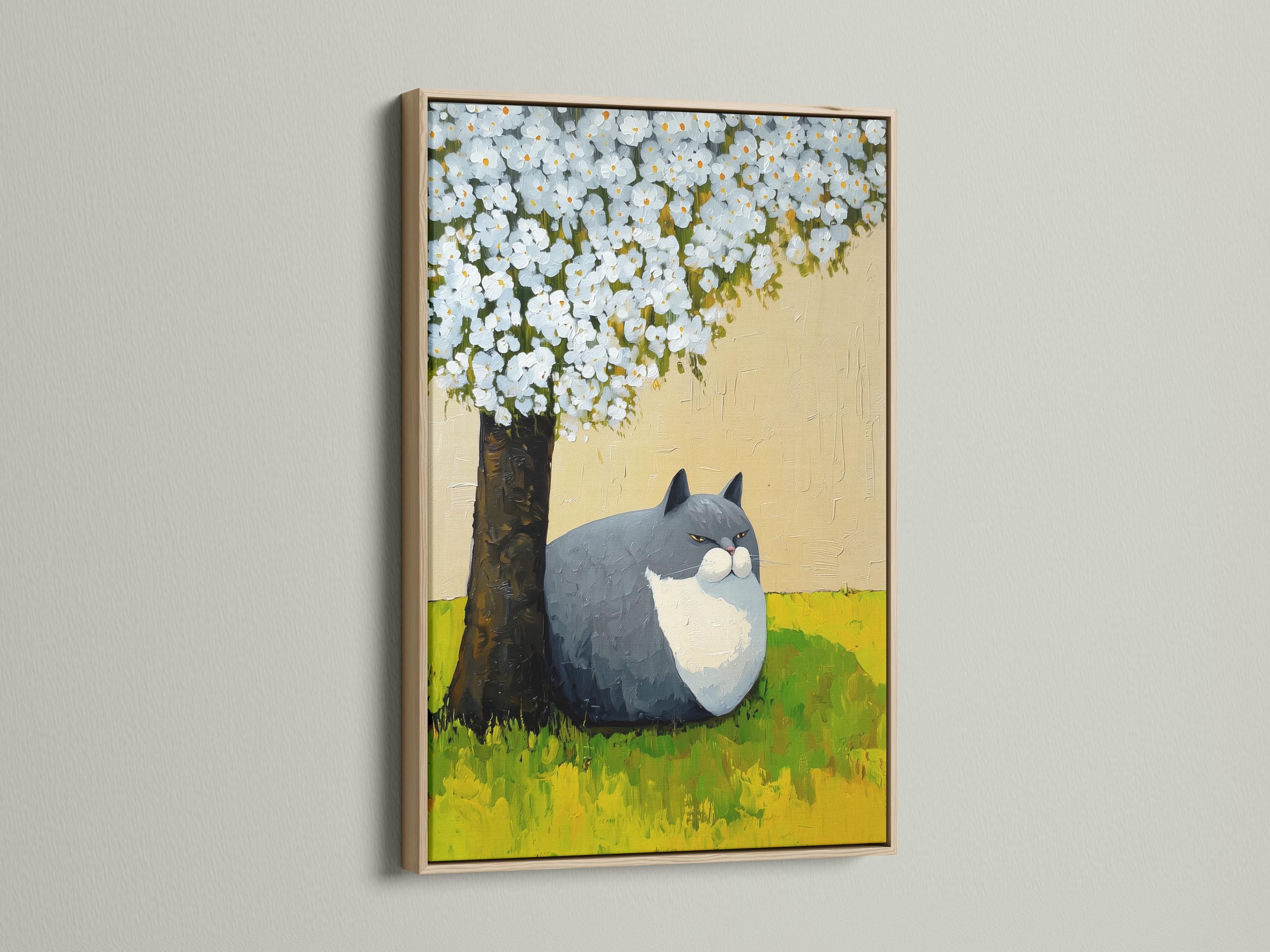 Grey and white cat lying on green grass beneath a tree with white blossoms detail view