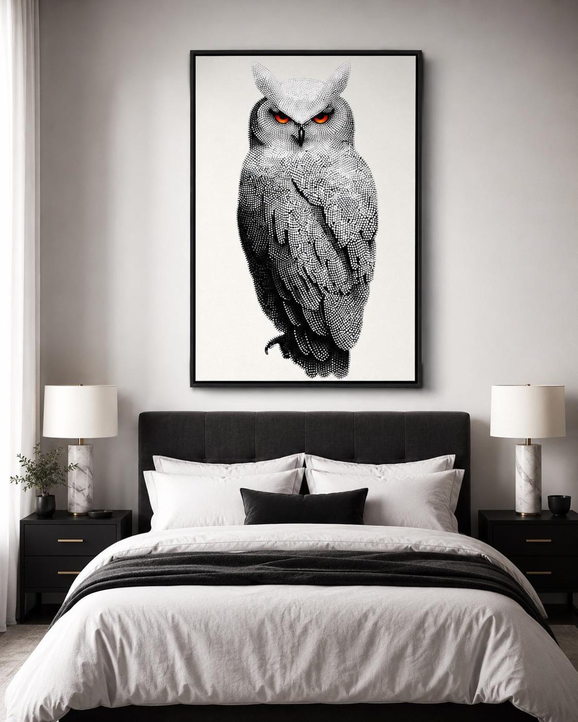 Dotted owl artwork in black and white with bright red-orange eyes detail view