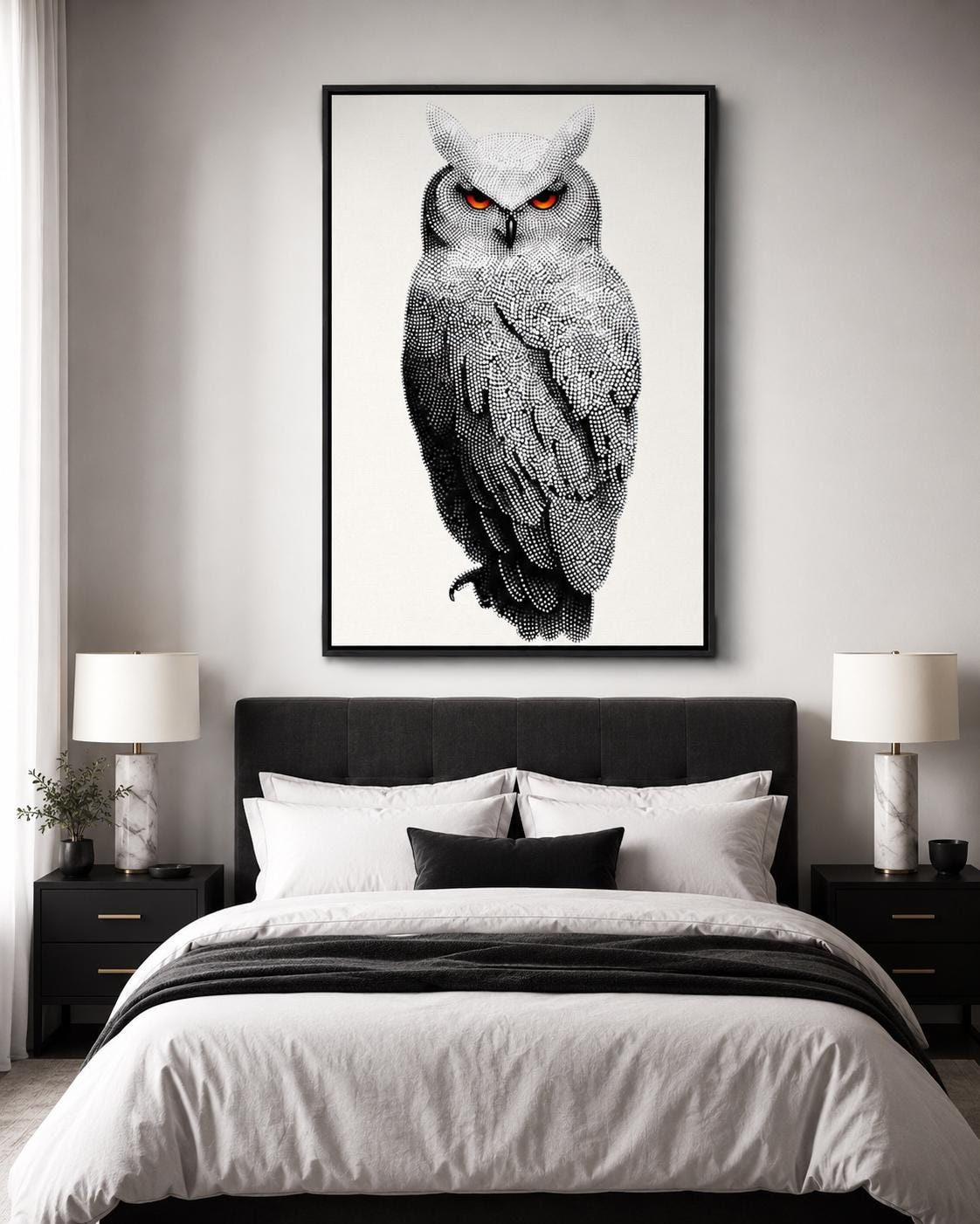 Dotted owl artwork in black and white with bright red-orange eyes detail view