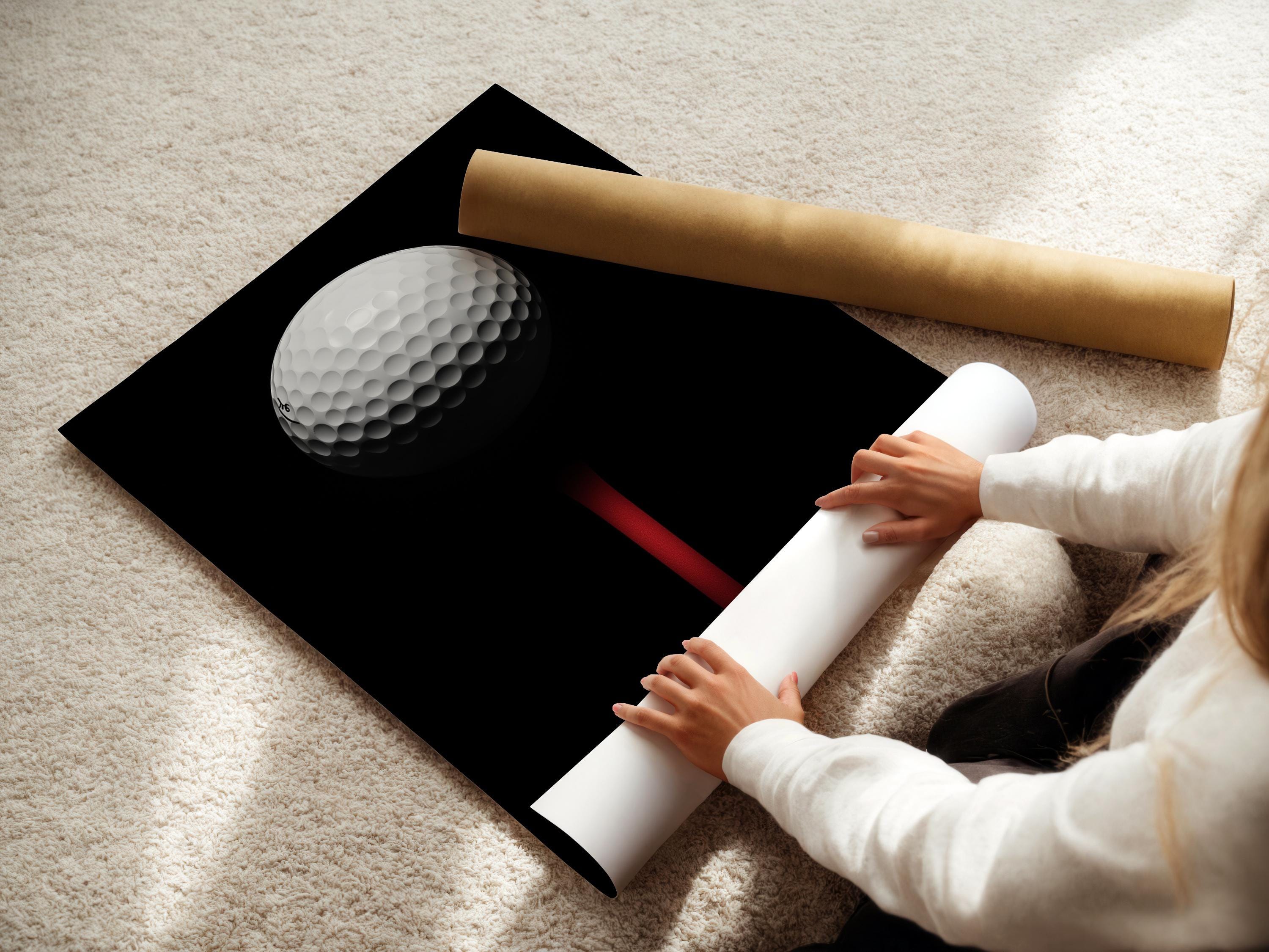 Minimalist golf ball design on a black background with a vivid red vertical accent detail view