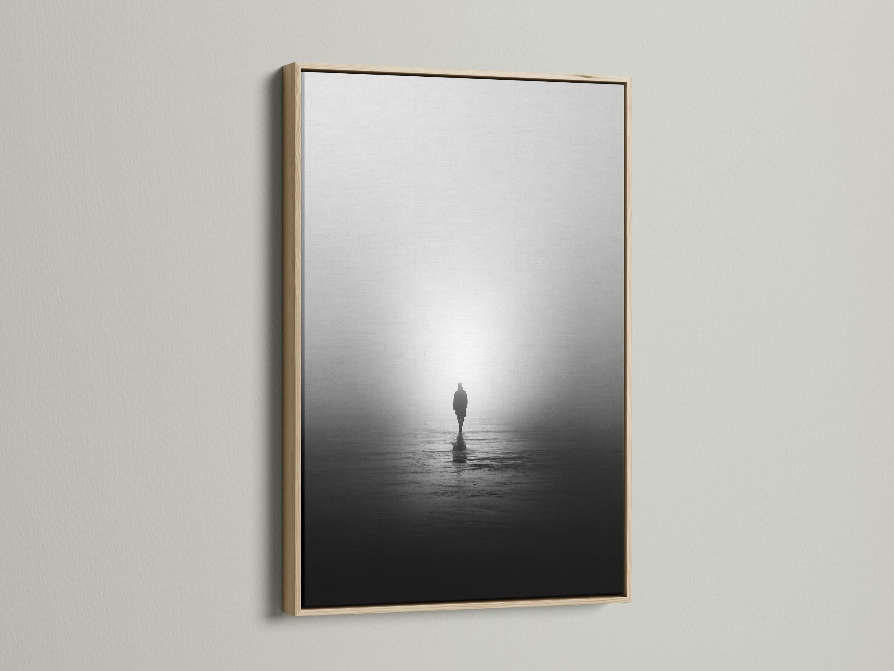 Monochrome misty shore scene with a solitary standing figure and reflection on dark water detail view