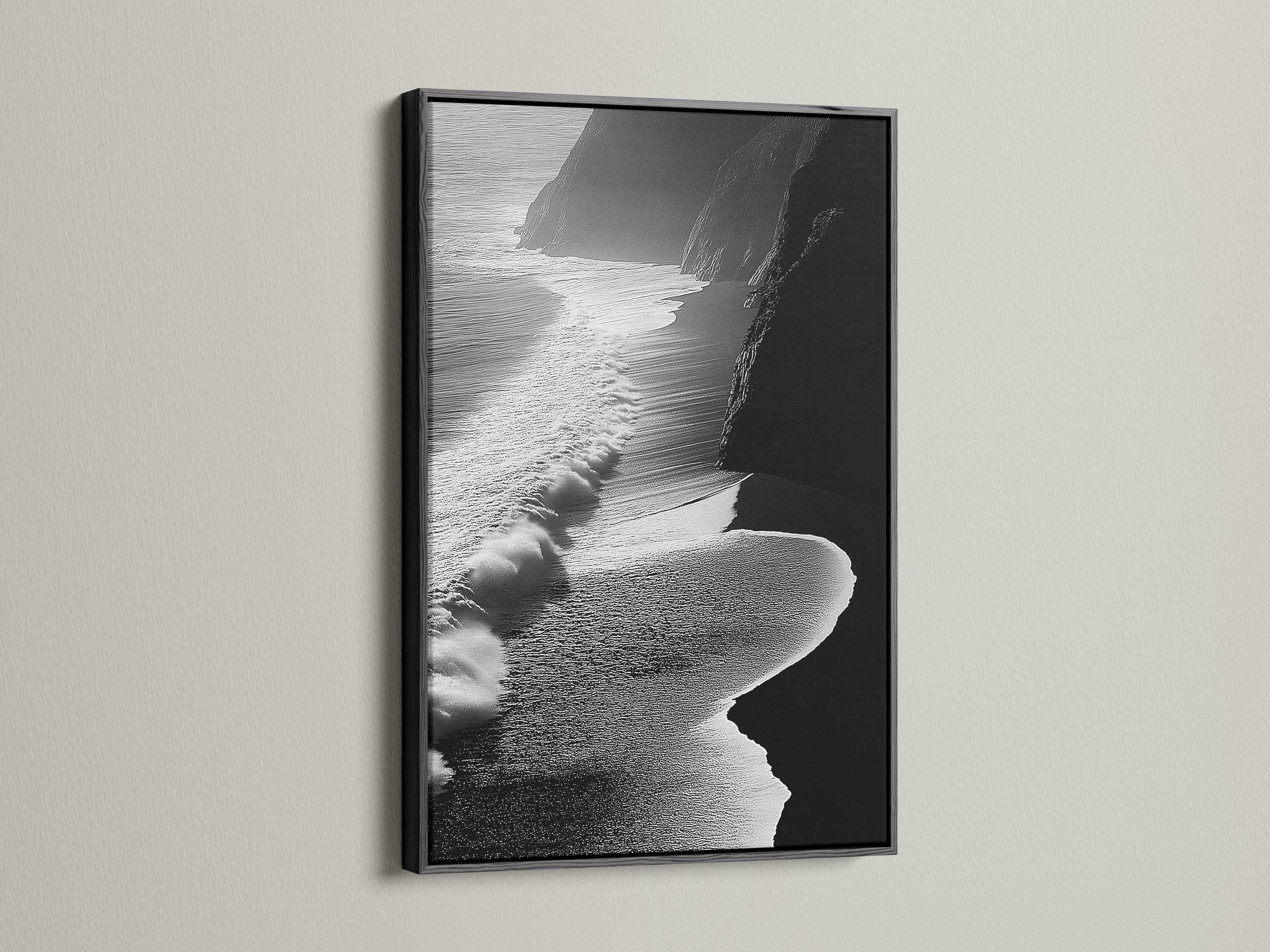 A monochrome seascape shows foamy wave textures breaking along a shoreline, with dark cliff-like shapes framing the scene detail view