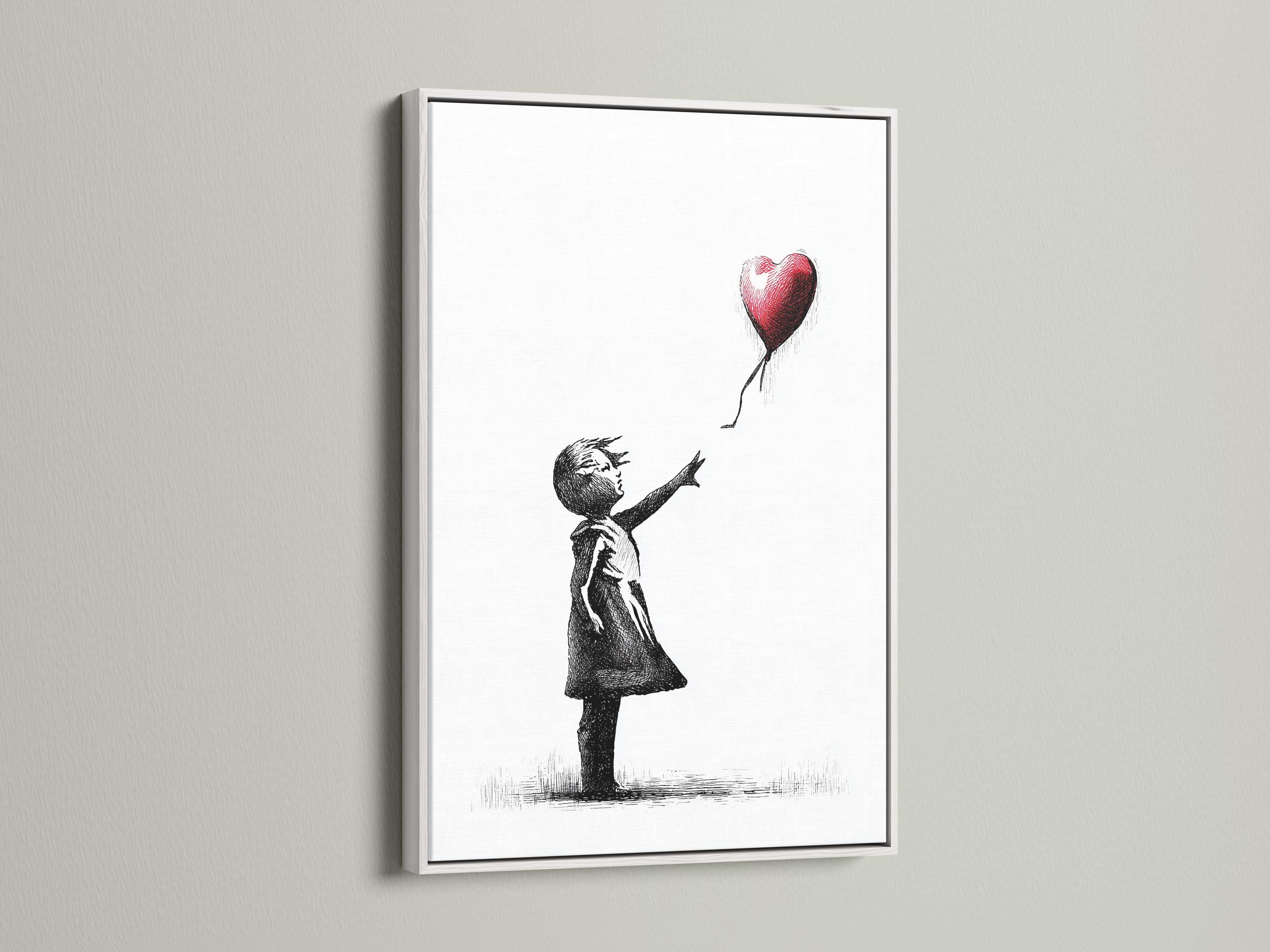 Room mockup showing a framed black and white girl sketch with a red heart balloon