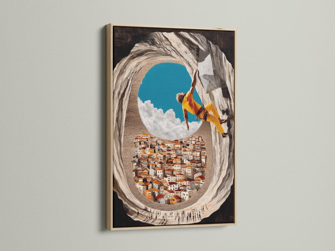Wall art mockup showing a framed climber scene hanging on a wall among other frame options