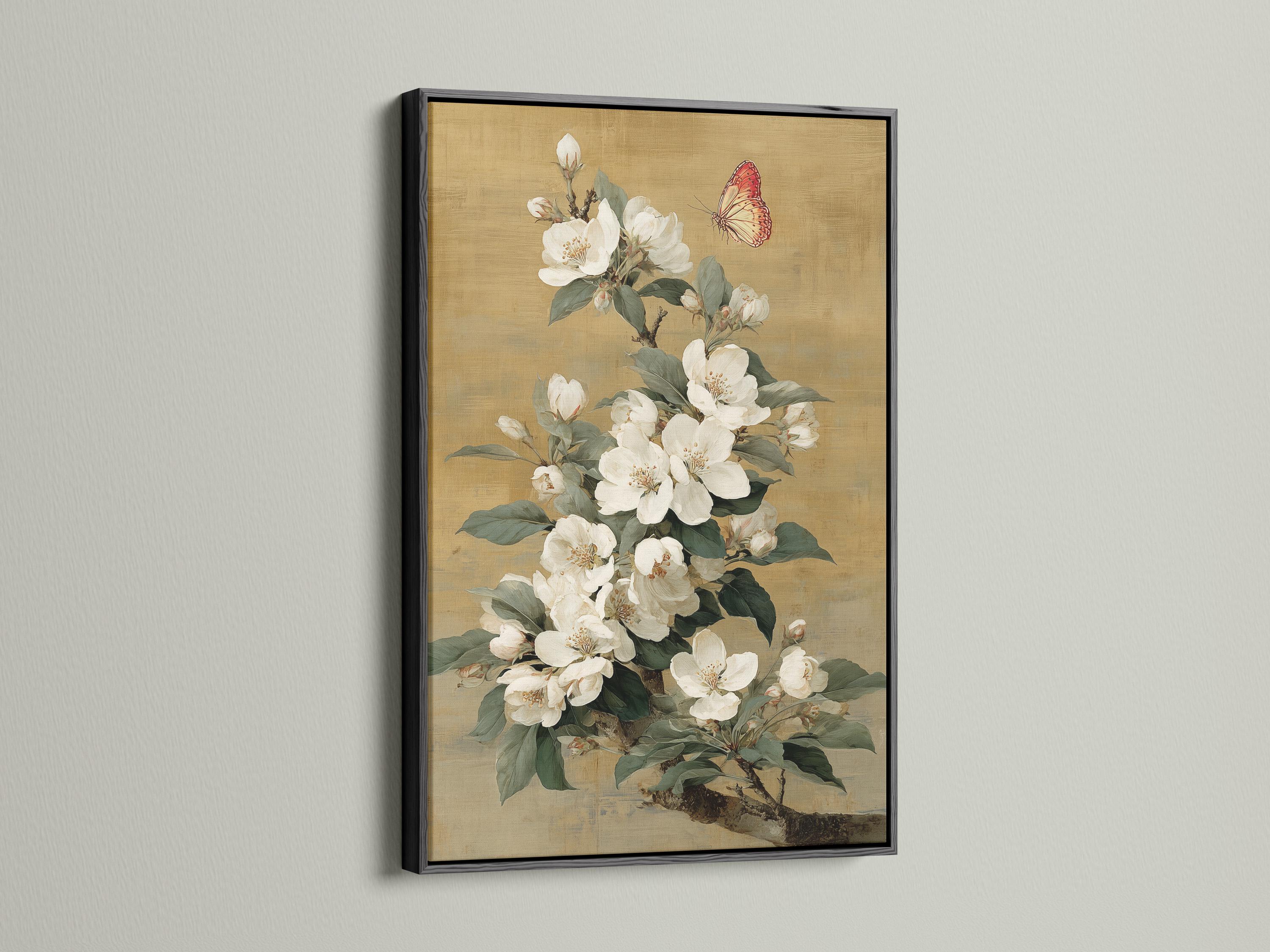 Vertical framed artwork mockup on a light wall with a bouquet of white blossoms and a butterfly