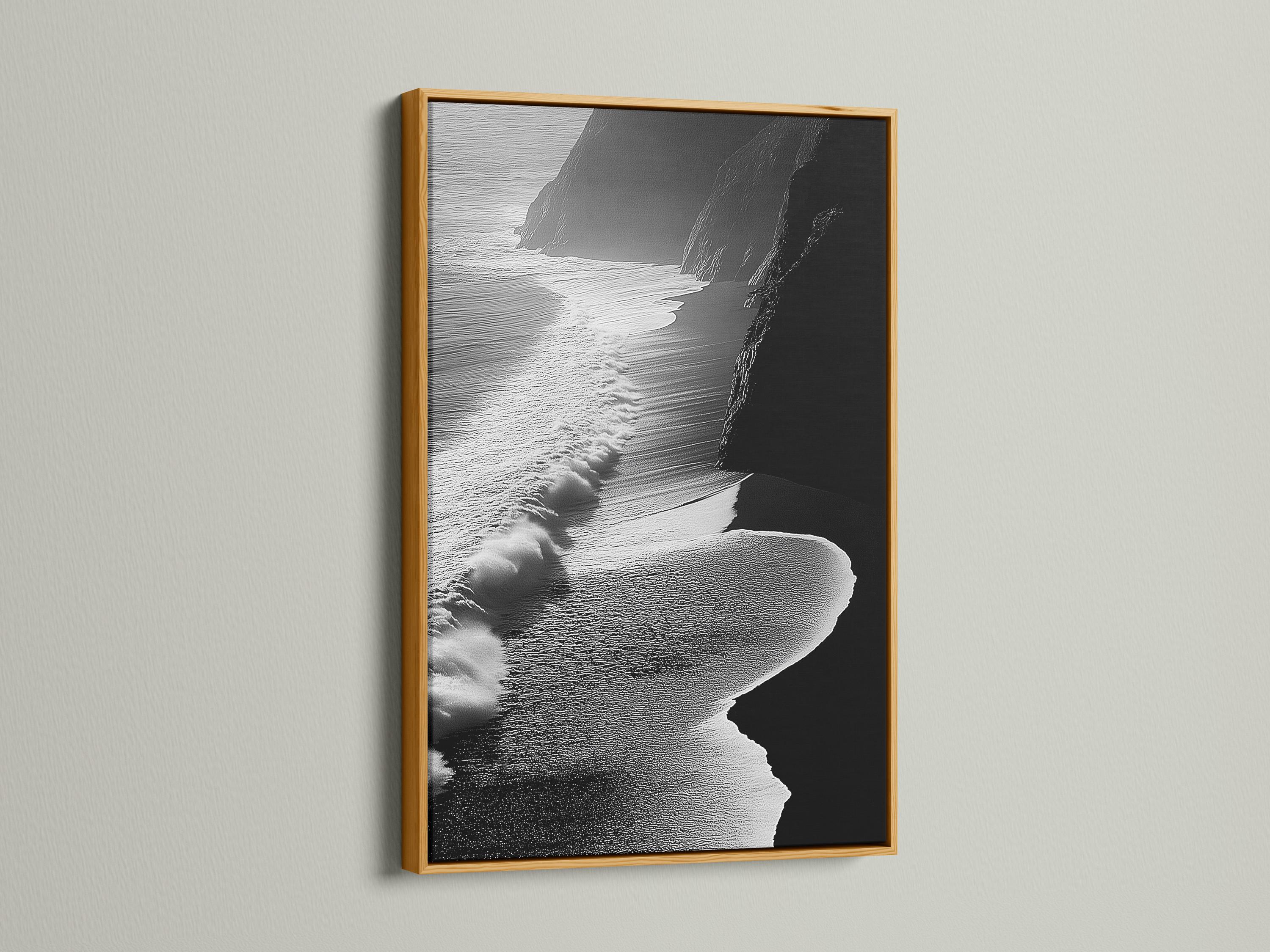 A monochrome seascape shows foamy wave textures breaking along a shoreline, with dark cliff-like shapes framing the scene detail view