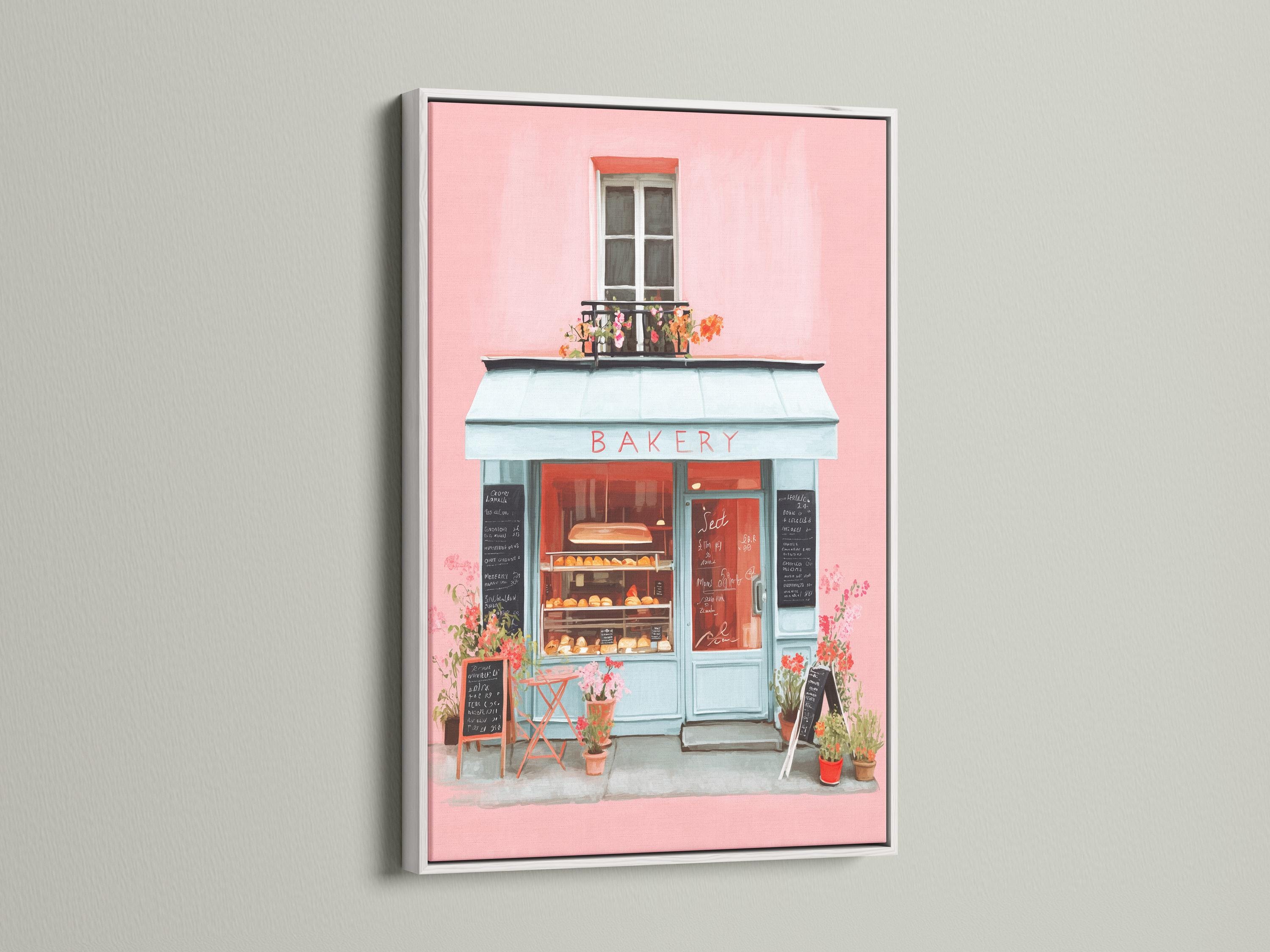 Room mockup showing a framed pastel bakery shopfront illustration
