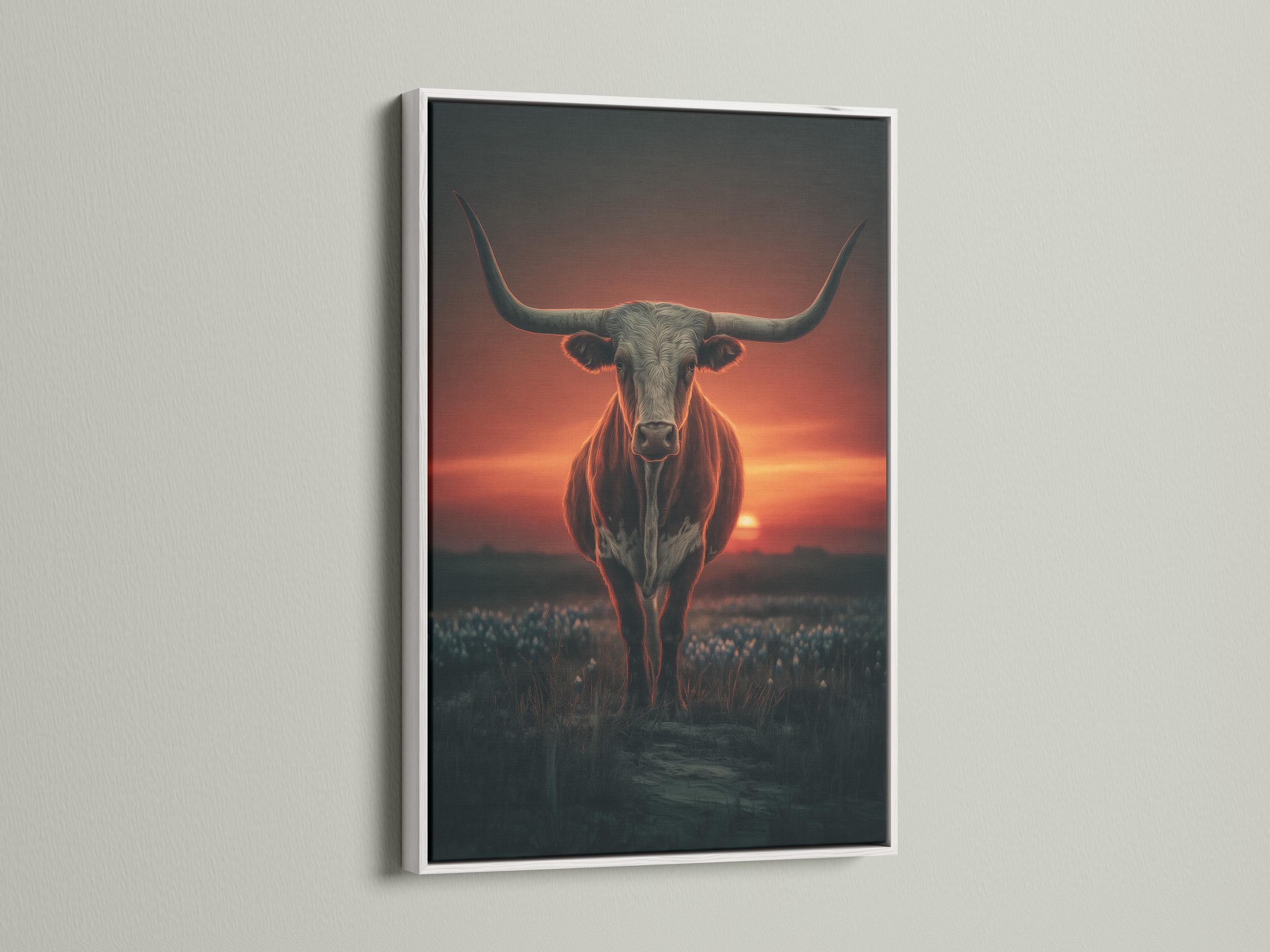 Room mockup showing a framed longhorn bull artwork with a sunset background