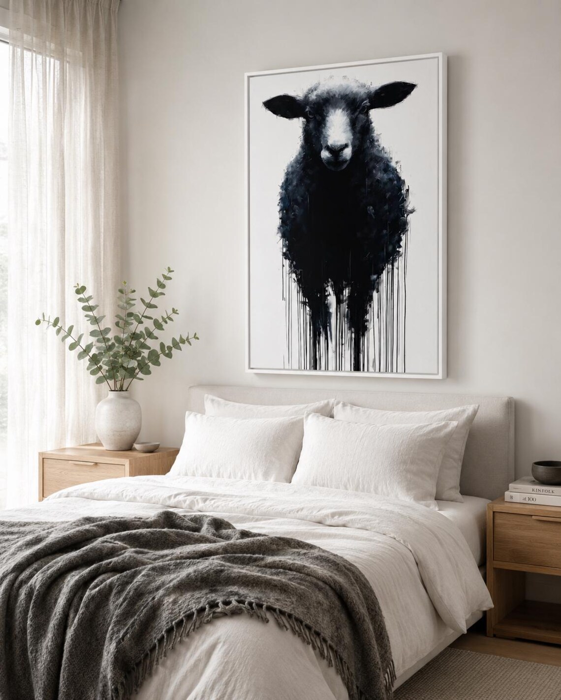 Sheep portrait artwork displayed in a bright industrial-style room