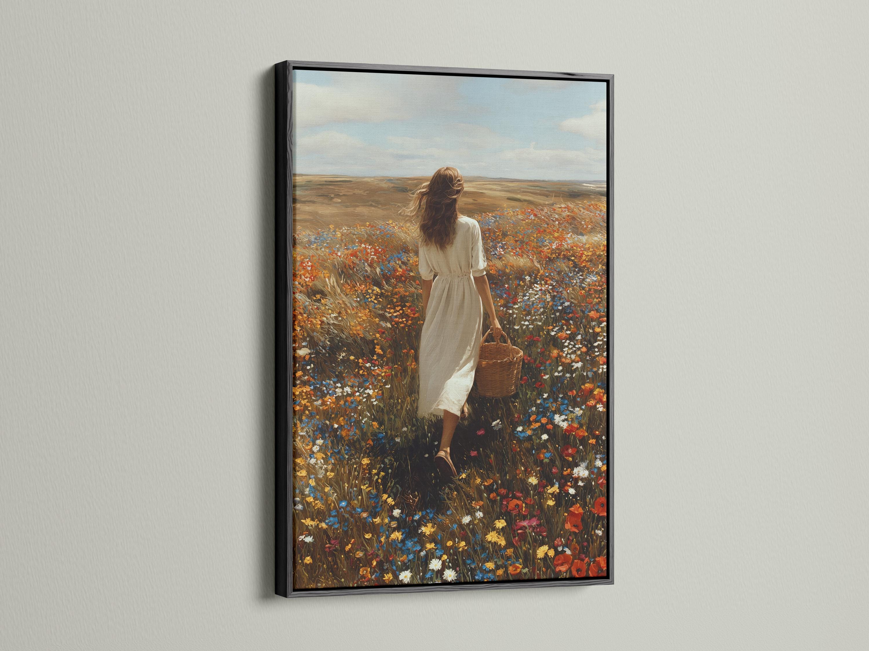 Mockup showing framed wildflower meadow artwork with a woman walking in a field of flowers