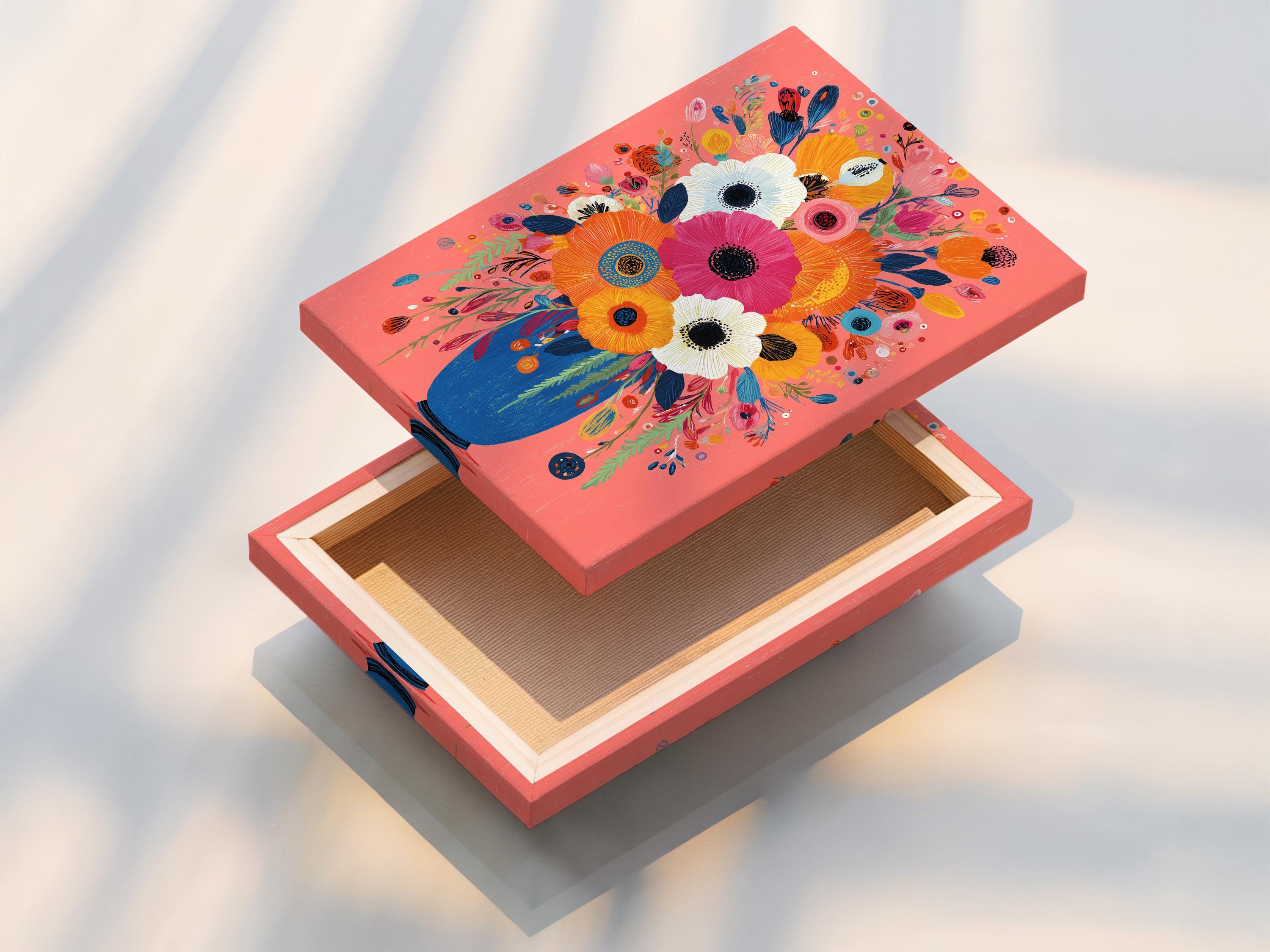 Stylised floral bouquet with large pink flowers in a blue vase on a coral background detail view