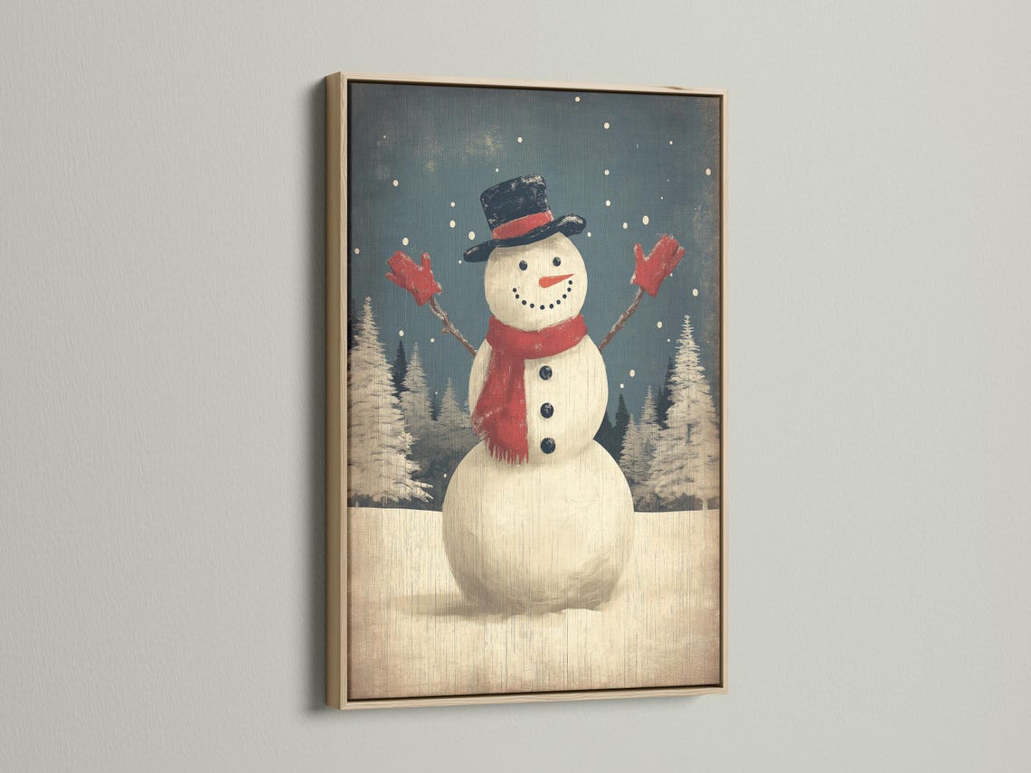 Snowman standing in falling snow with a dark top hat and red scarf in a winter forest scene detail view