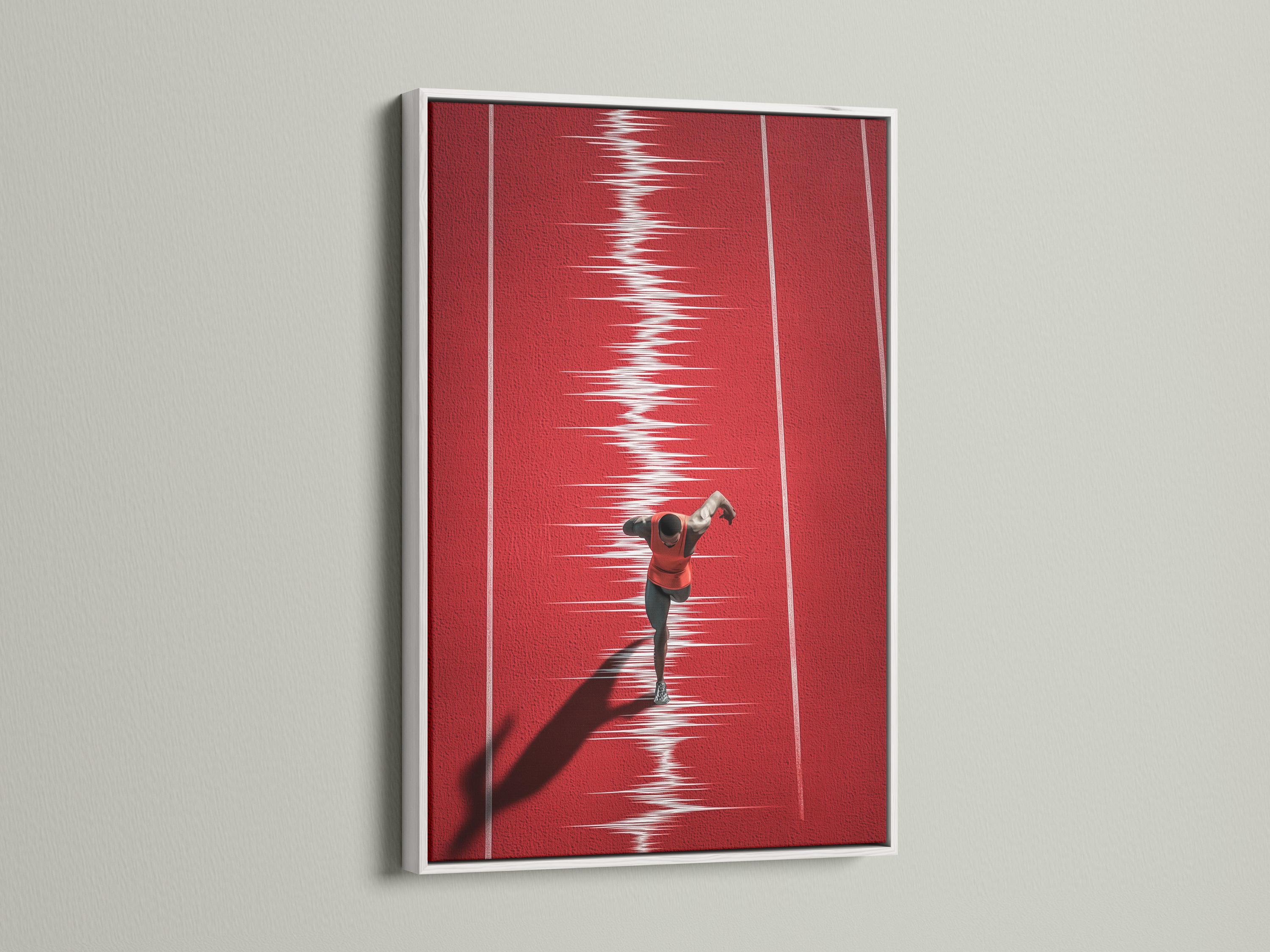 Mockup showing a framed red runner track artwork on a light wall