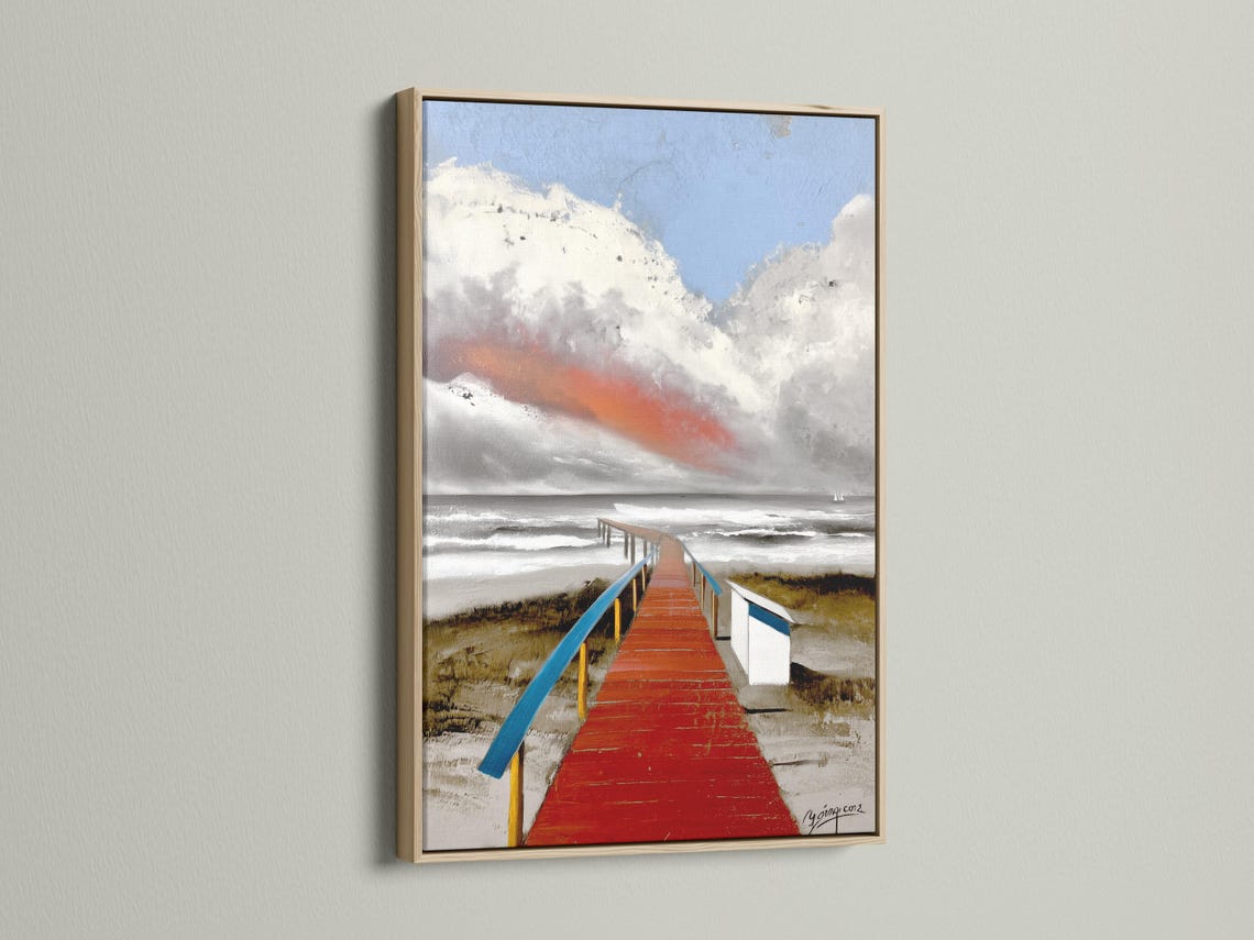 Red boardwalk leading to the sea with blue rails, waves and a cloudy sky detail view