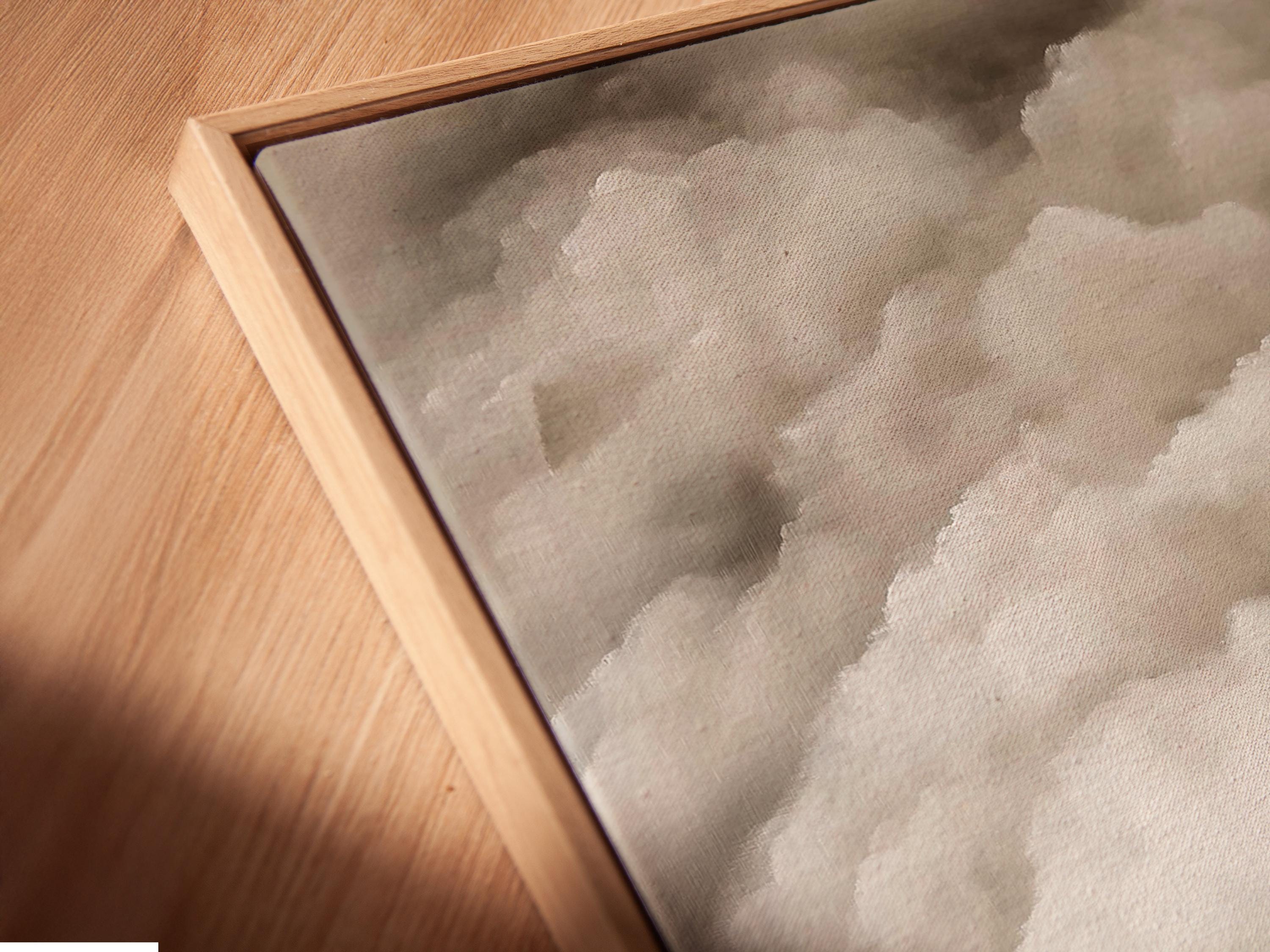 A wooden door emerges from soft grey and white clouds with warm beige ground beneath detail view