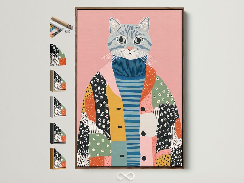A pink background cat portrait wearing a blue striped sweater with patchwork shapes below