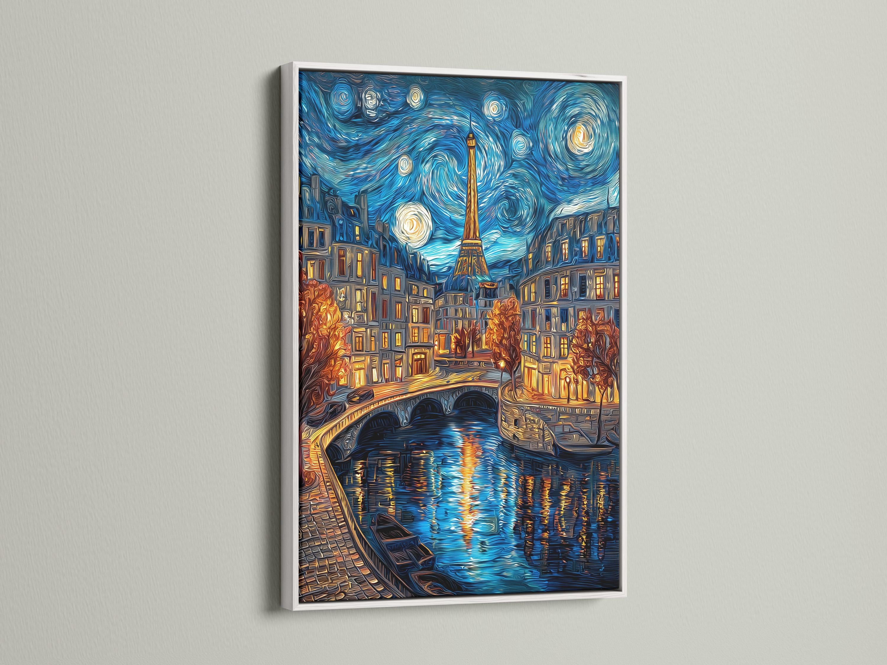 Woman hanging a framed night cityscape painting featuring the Eiffel Tower on a brick wall