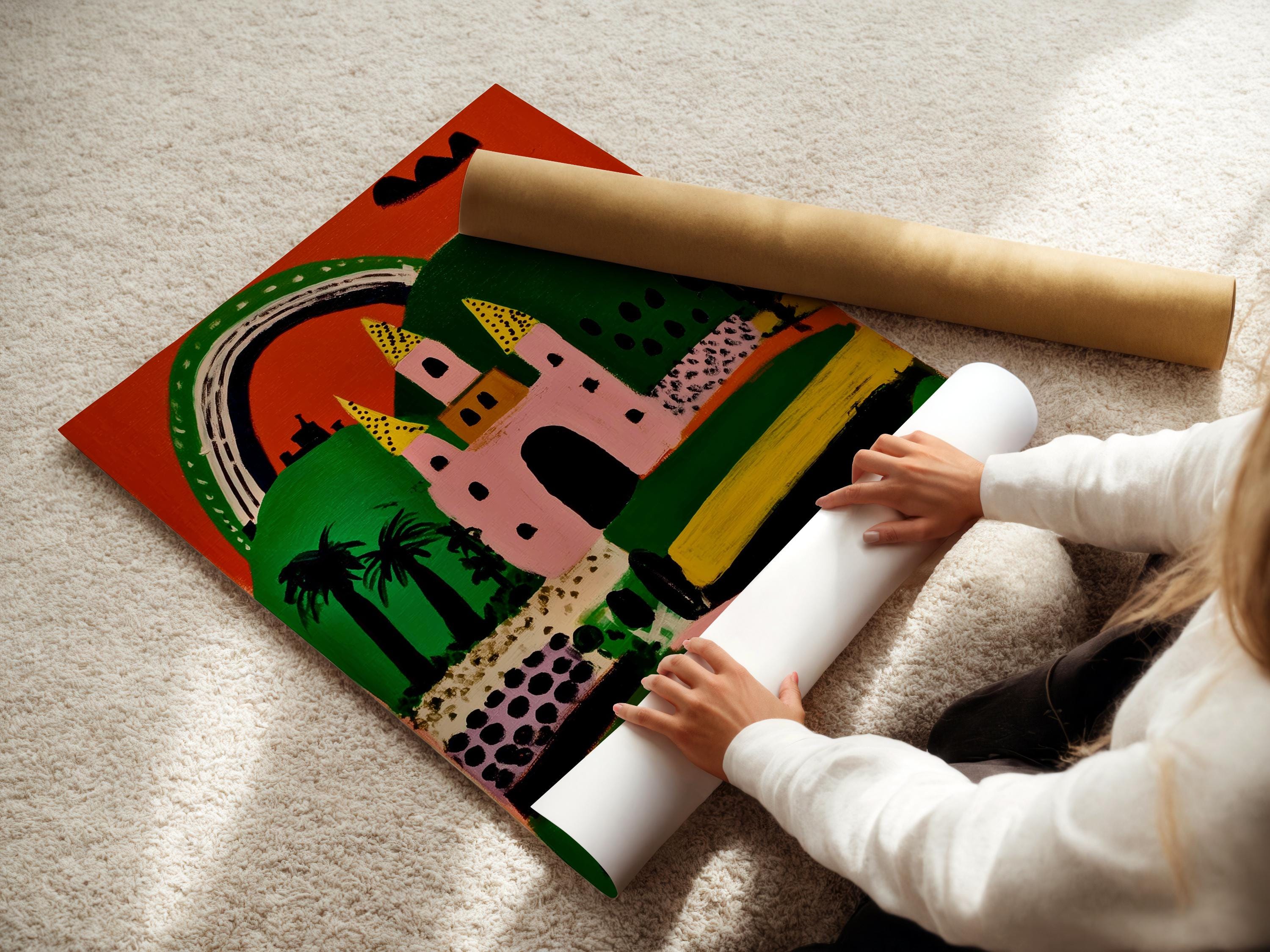 Whimsical pink and green castle with a rainbow arch and yellow tower shapes detail view