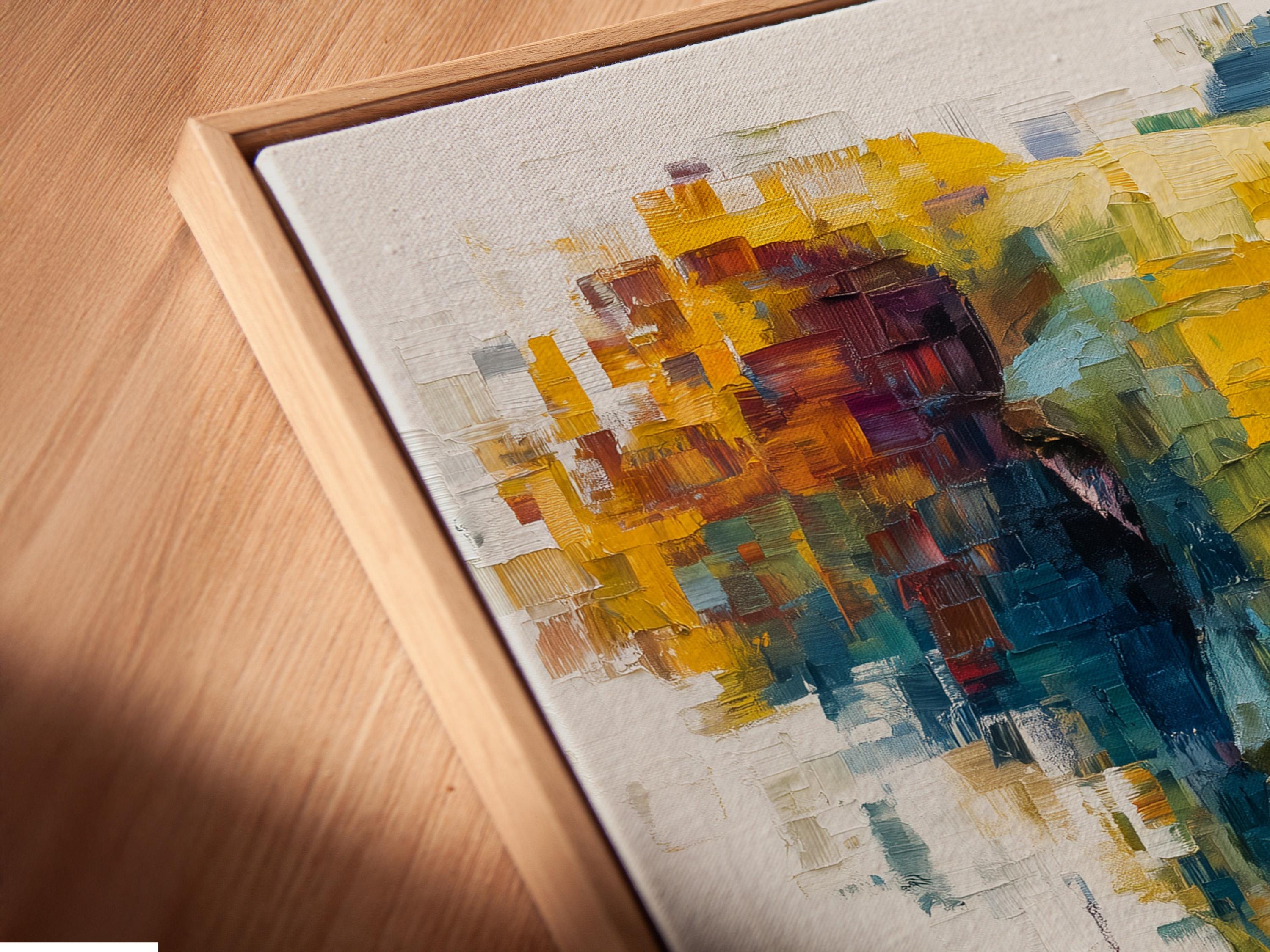 Abstract elephant artwork with layered teal, yellow and magenta colour blocks on an off-white background detail view
