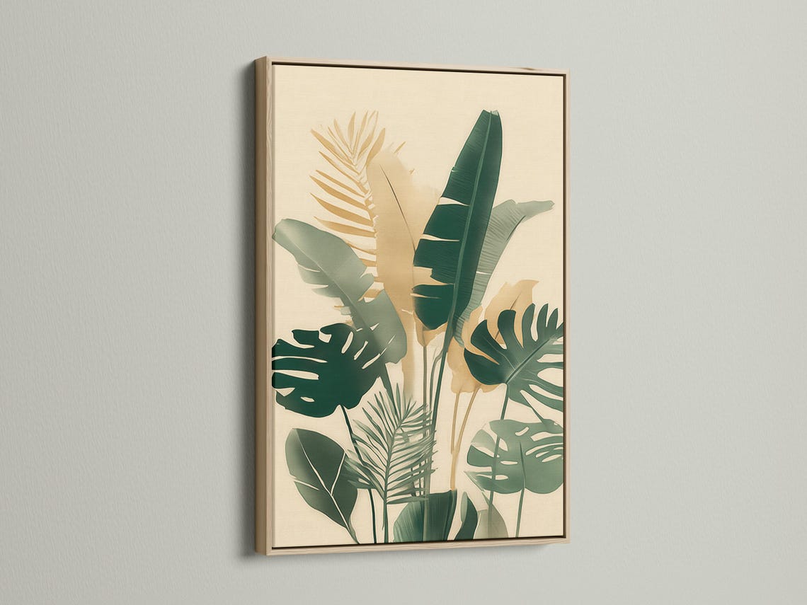 Room mockup showing framed botanical artwork with tropical leaves in cream and green