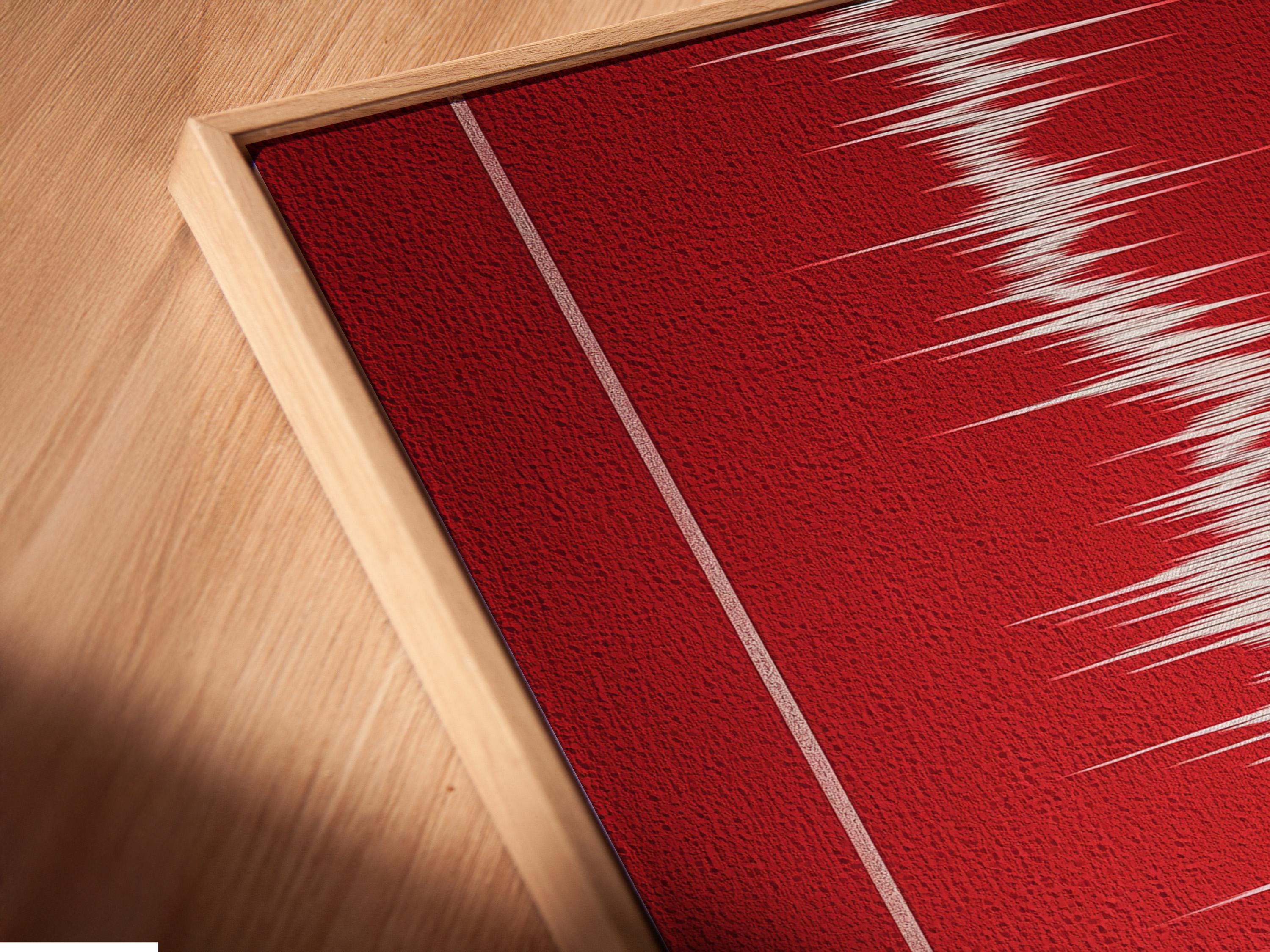 Mockup showing a framed red runner track artwork on a light wall