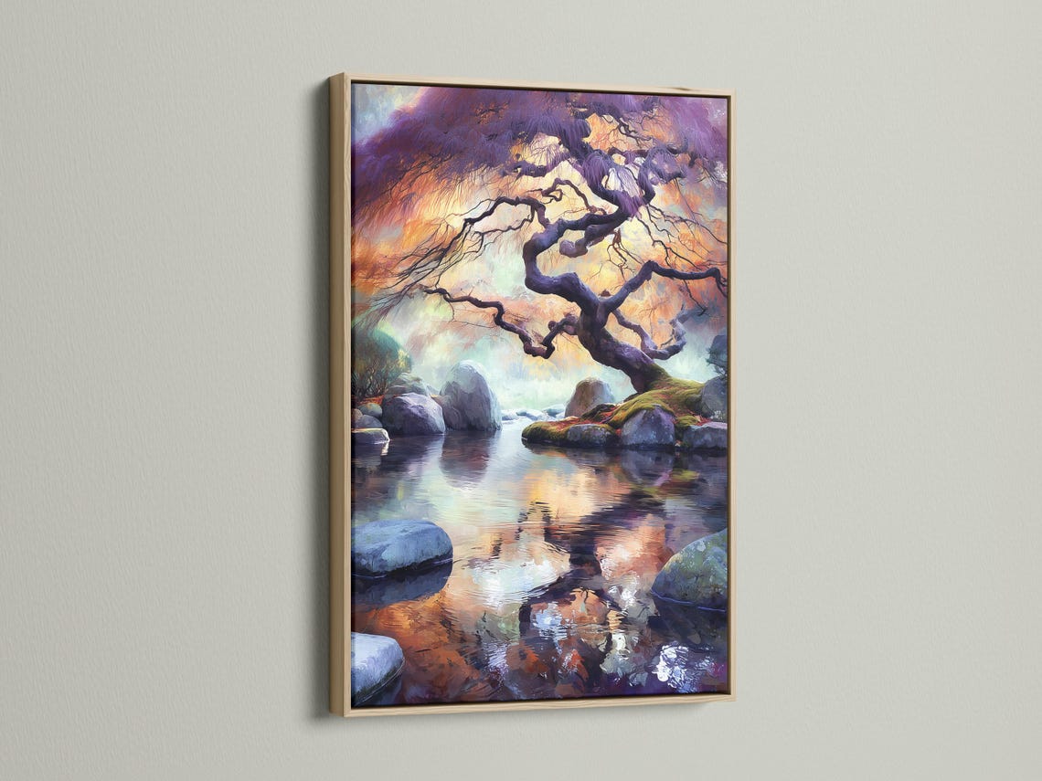Twisting tree silhouette over rocks and still water with purple orange sunset reflections detail view