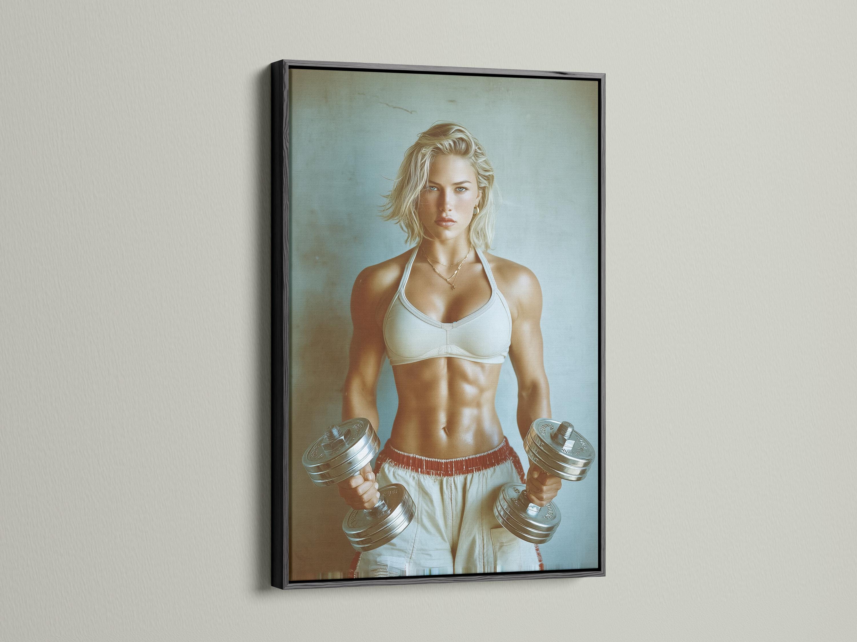 Room mockup showing a framed fitness portrait of a woman holding dumbbells on a teal background