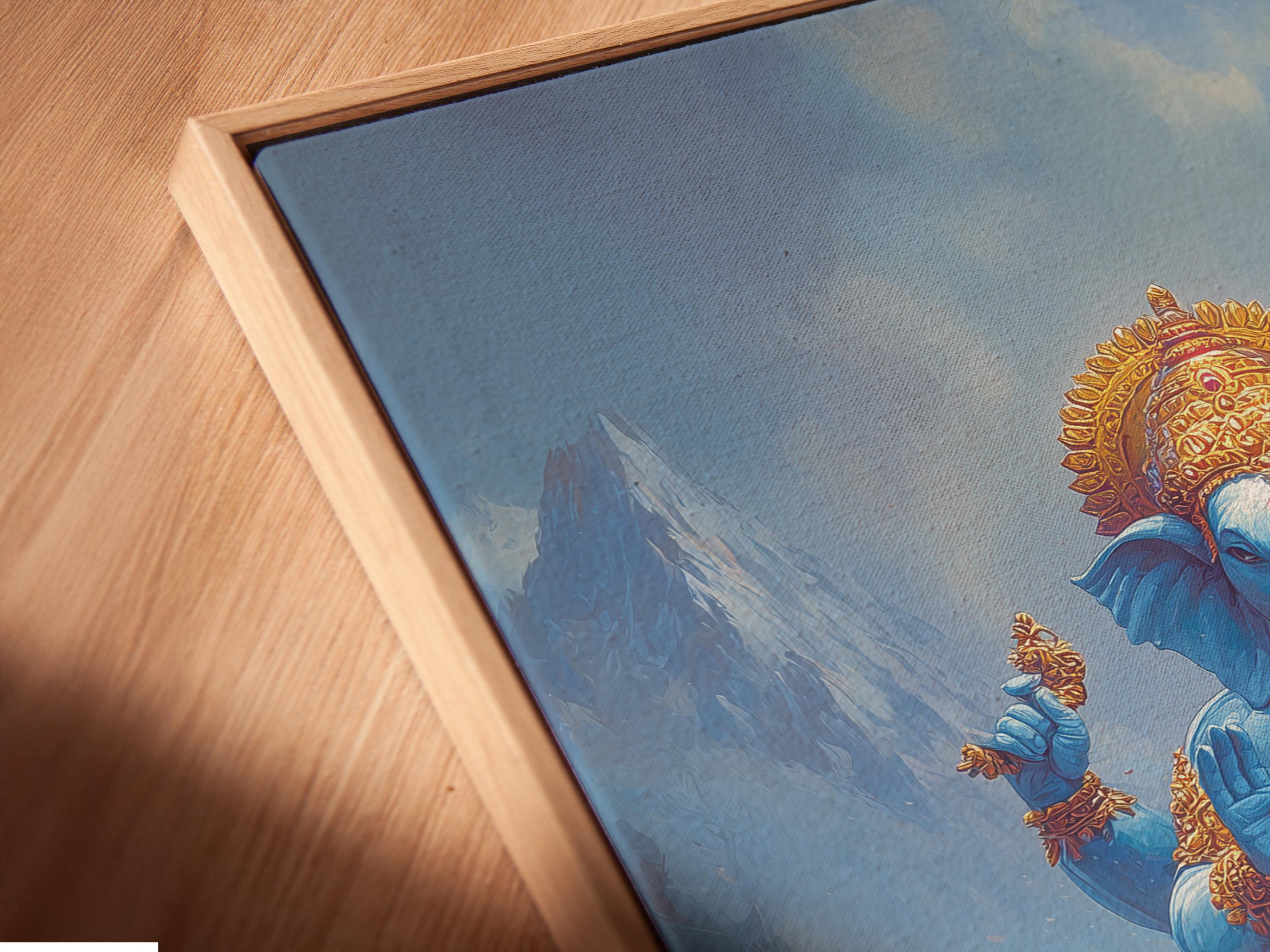 Framed artwork mockup showing a blue elephant-headed deity figure seated in meditation in a misty mountain scene