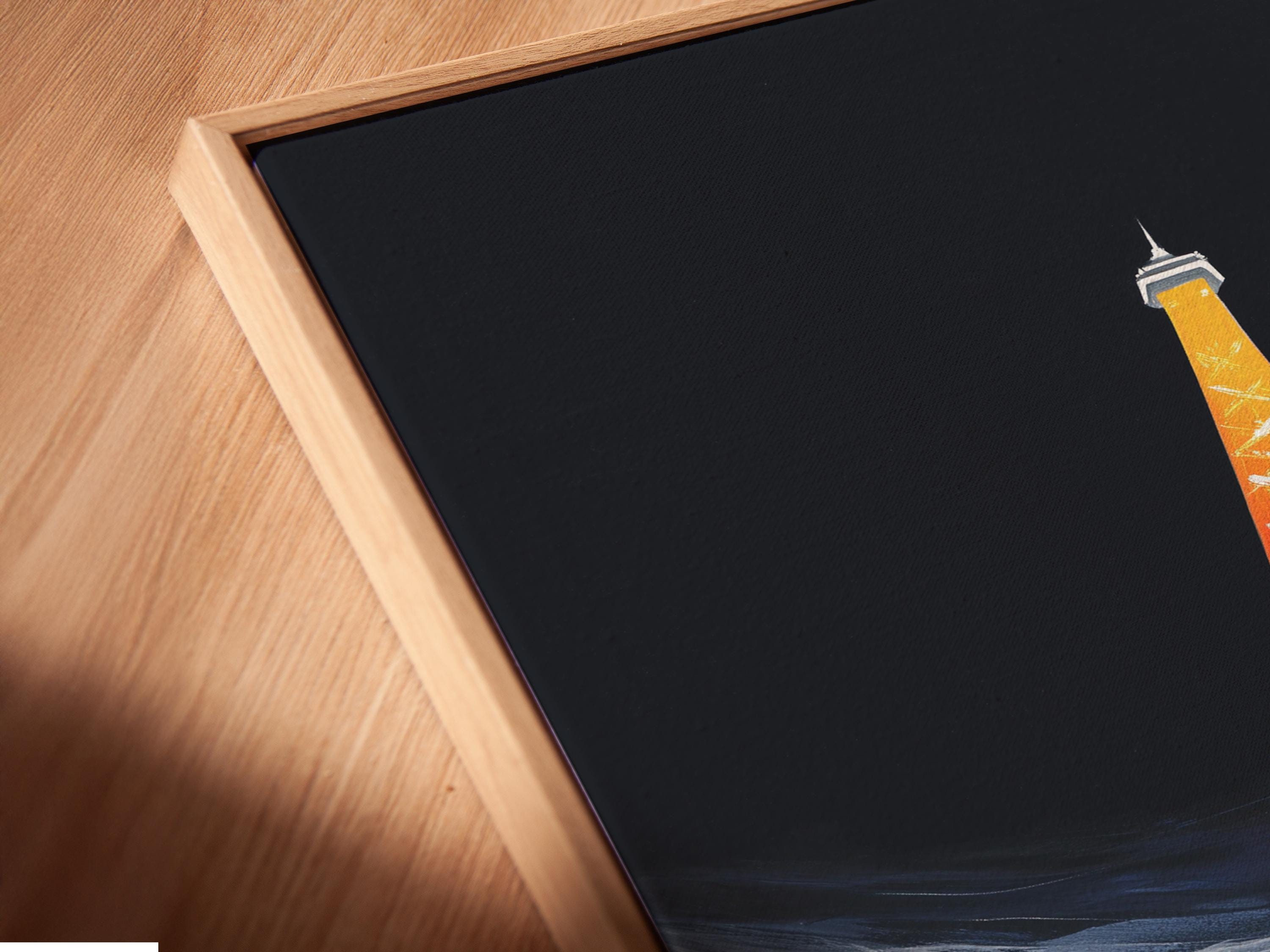 Room mockup showing framed Eiffel Tower artwork in red, orange and blue