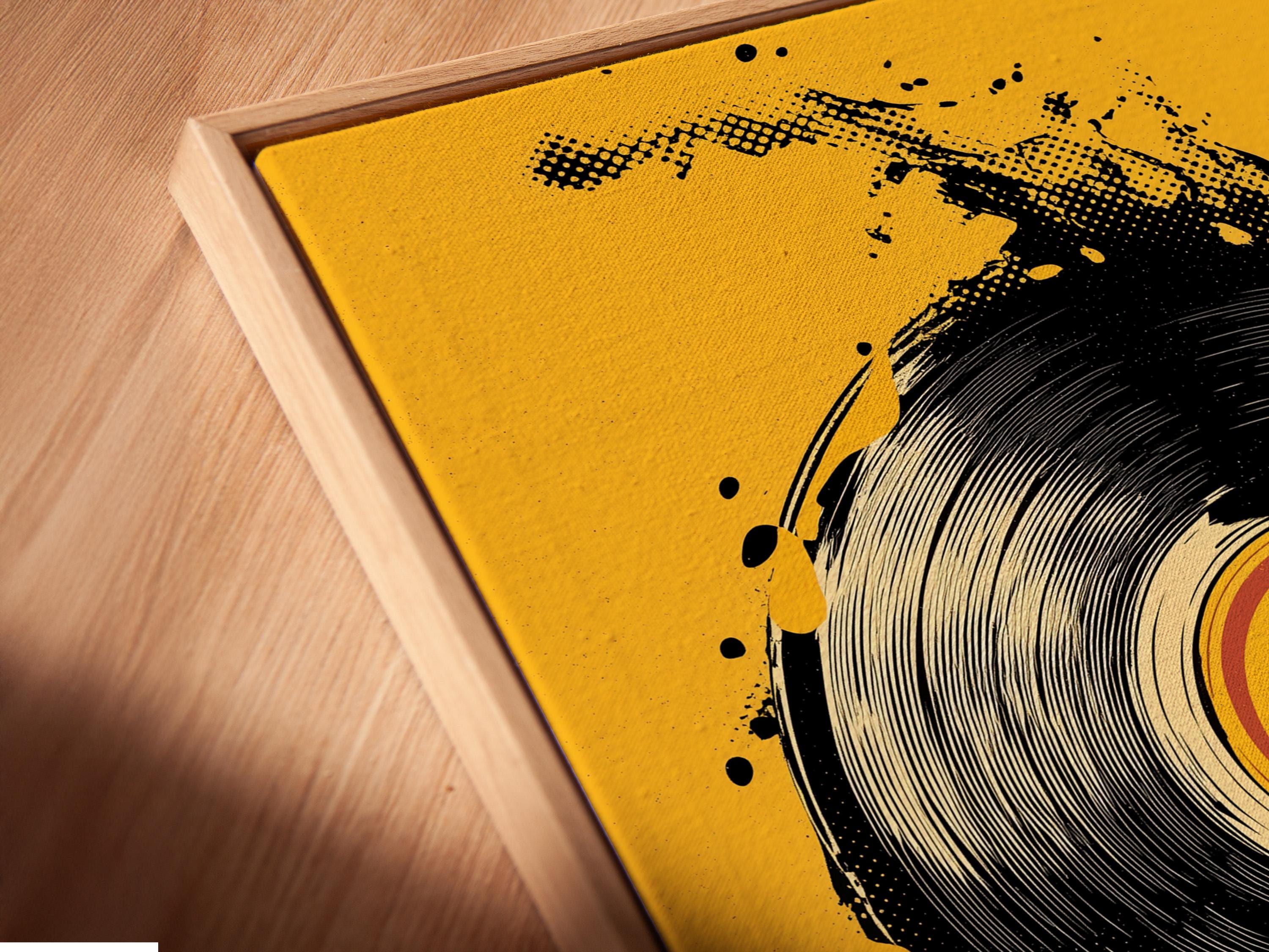 A man wearing headphones beside a music setup with a vinyl record artwork on a wall