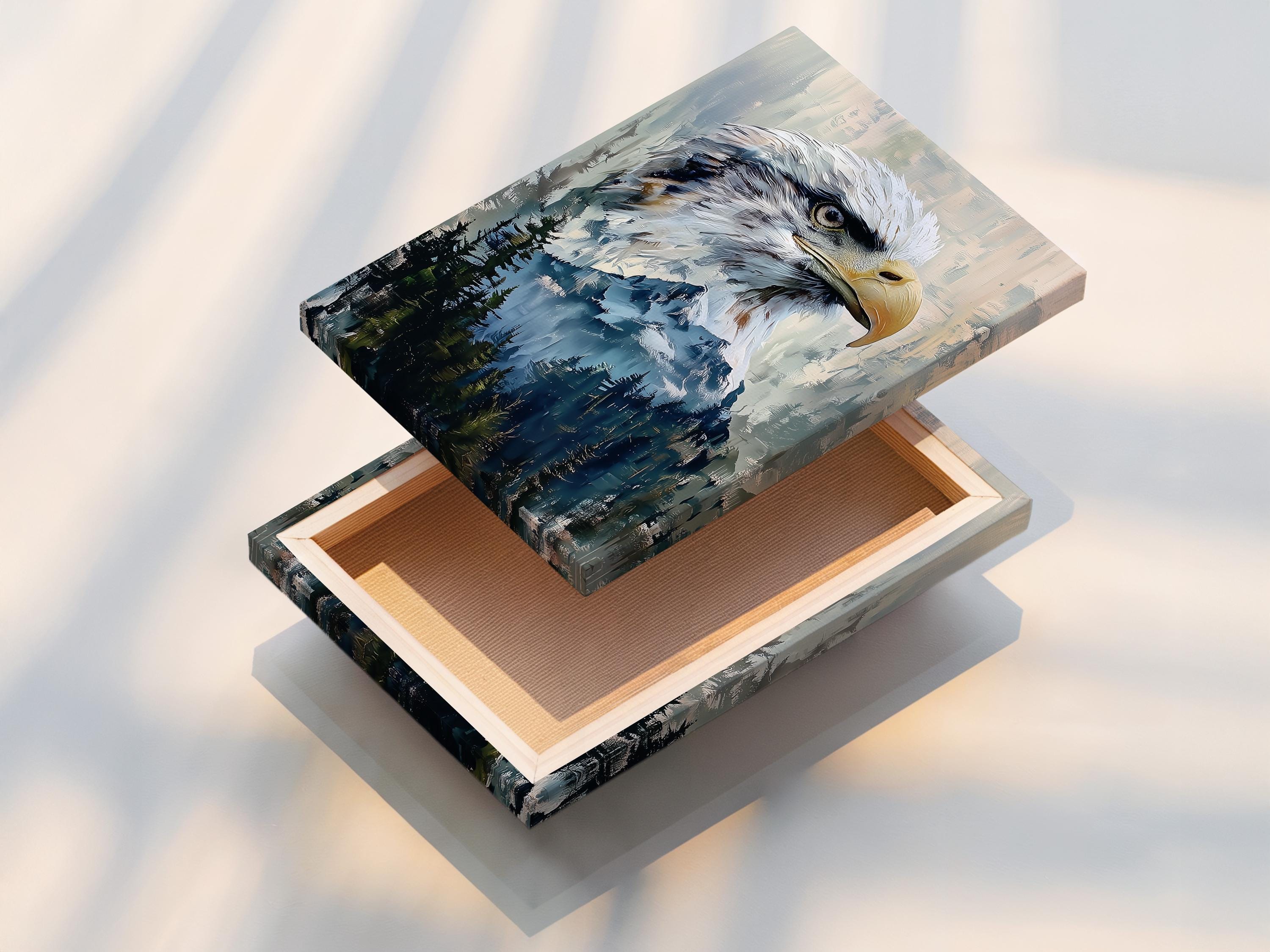 A framed eagle artwork on a wall with several framed mockups beside it