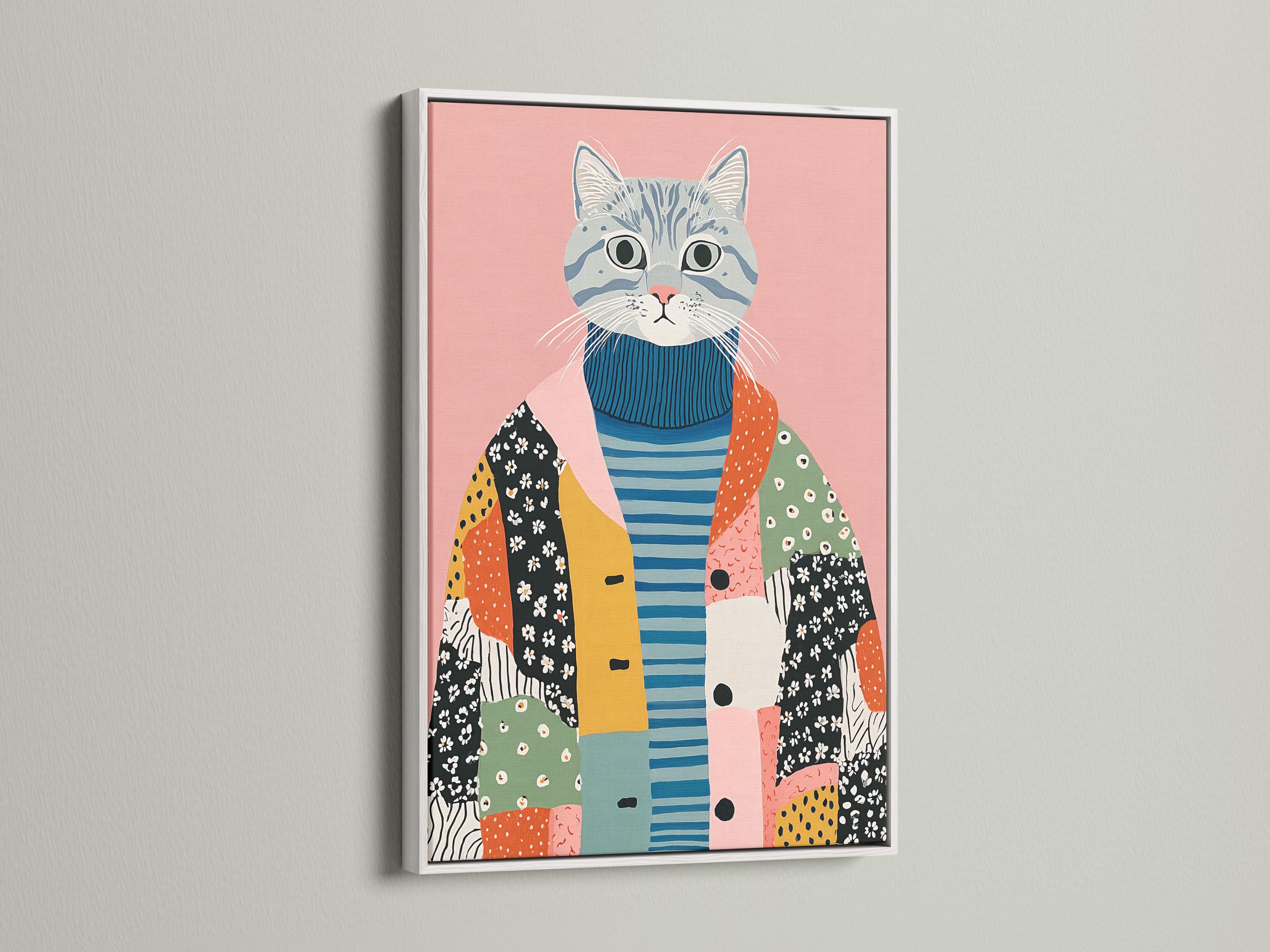 A pink background cat portrait wearing a blue striped sweater with patchwork shapes below detail view