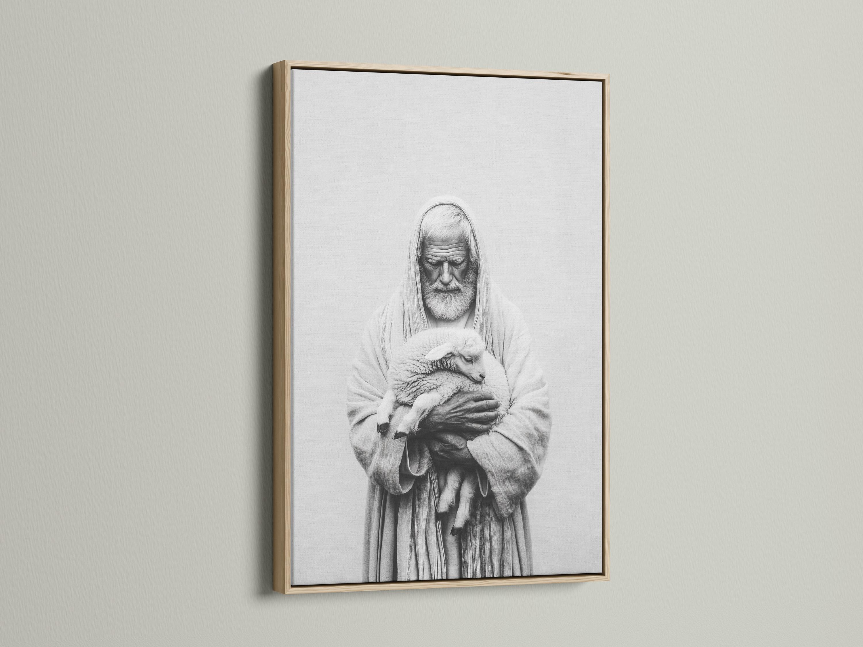 Room mockup showing a framed black-and-white portrait of a hooded shepherd holding a lamb